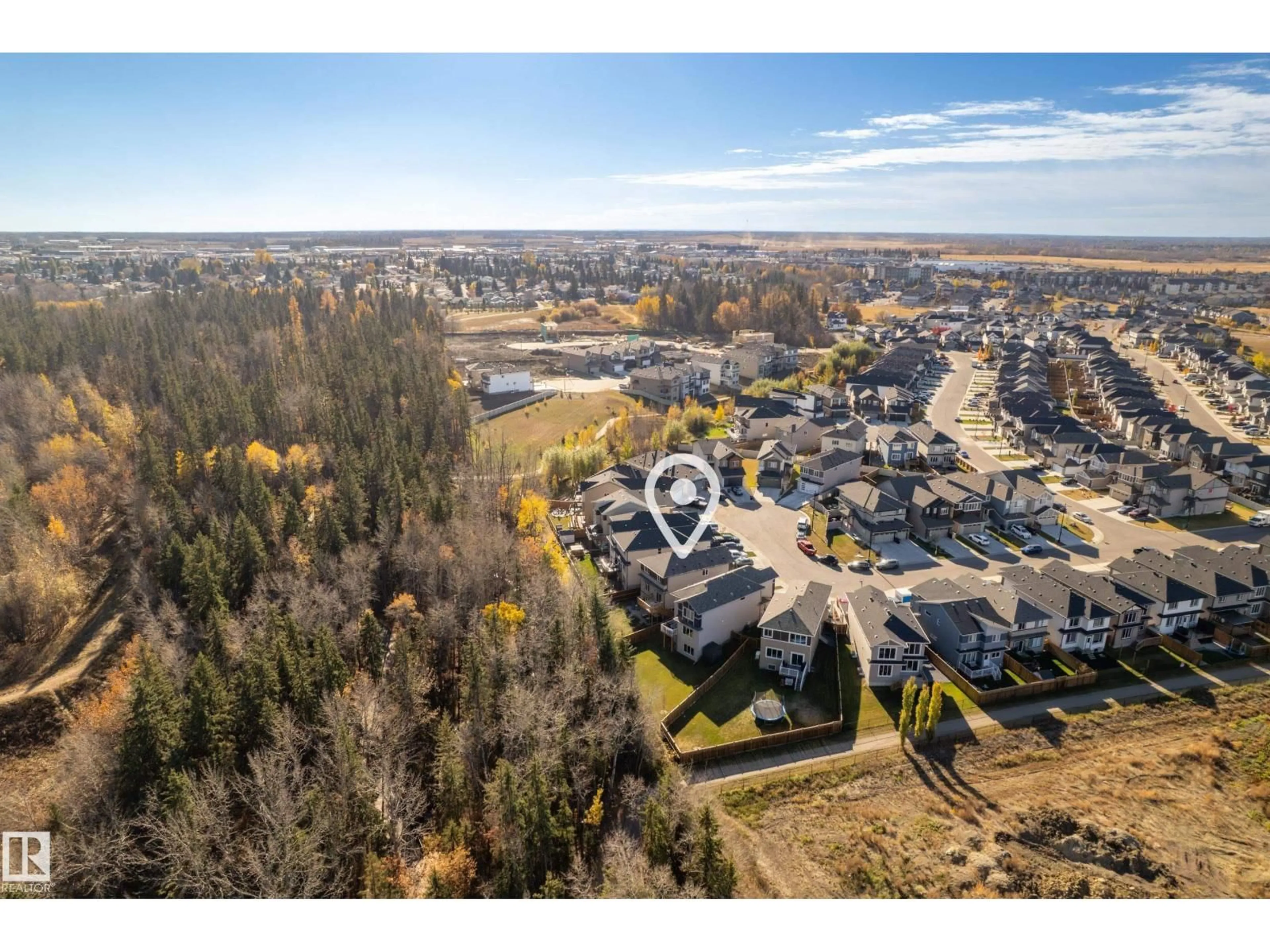A pic from outside/outdoor area/front of a property/back of a property/a pic from drone, unknown for 100 MEADOWLINK CM, Spruce Grove Alberta T7X0W1
