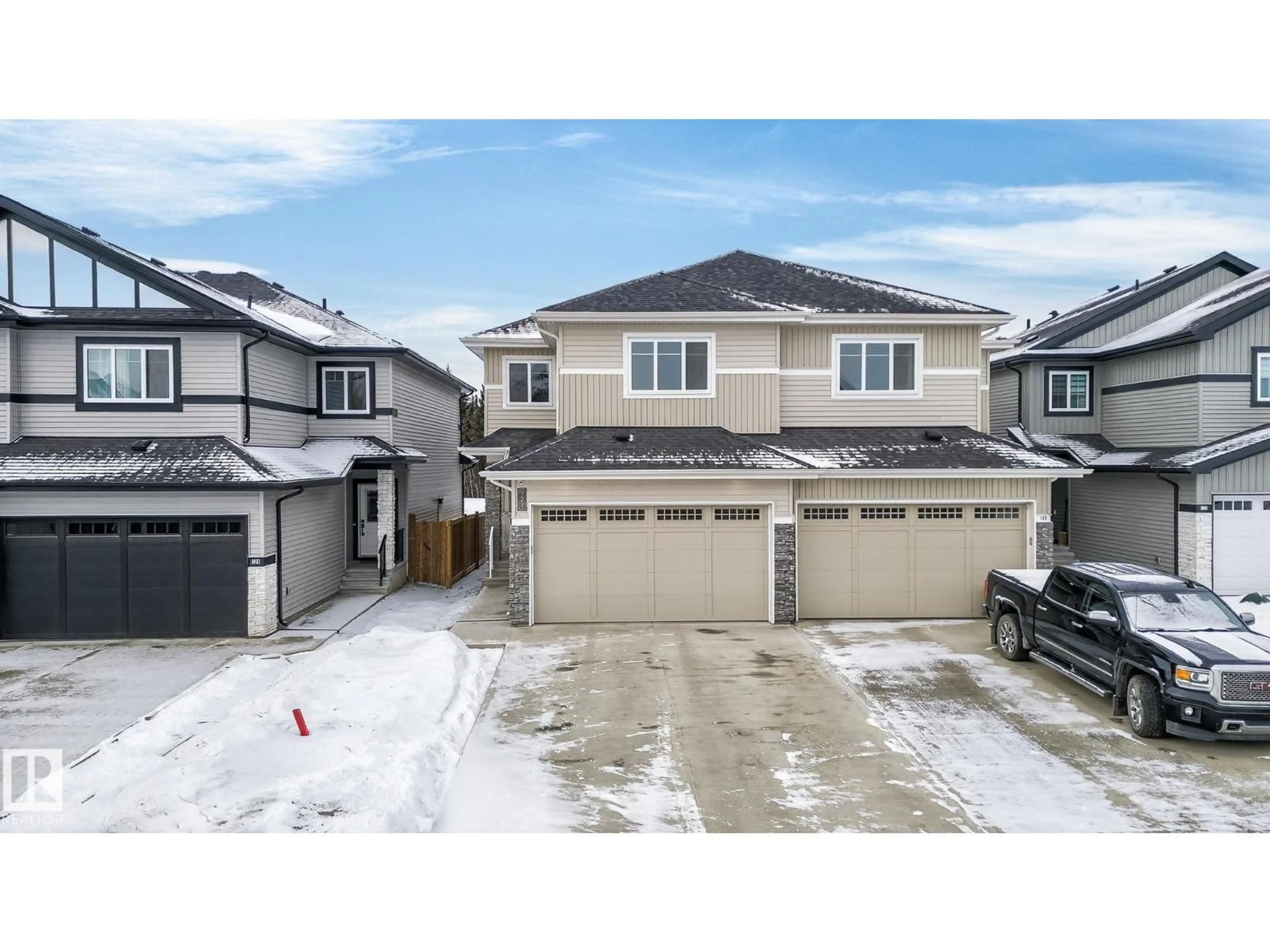 A pic from outside/outdoor area/front of a property/back of a property/a pic from drone, street for 127 HILTON CV, Spruce Grove Alberta T7X1Y4