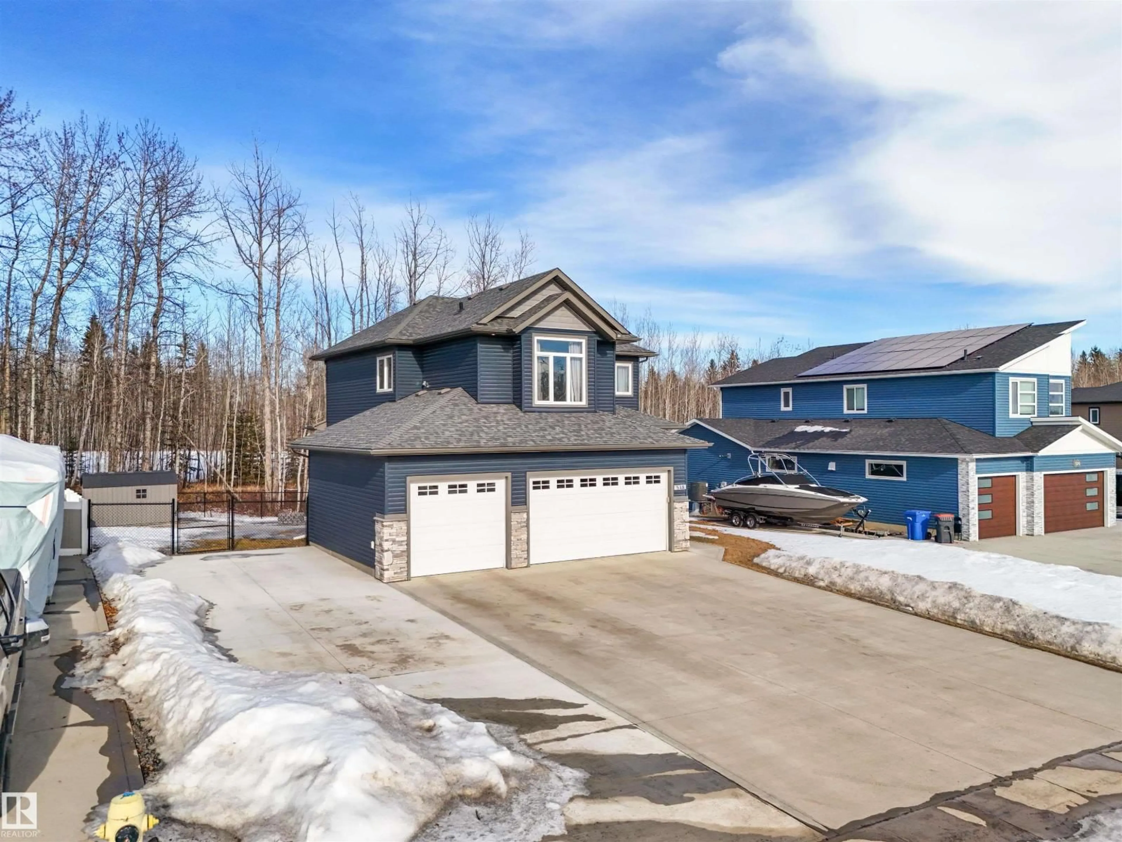 A pic from outside/outdoor area/front of a property/back of a property/a pic from drone, street for 518 - 49119 RGE ROAD 73, Rural Brazeau County Alberta T7A0B9