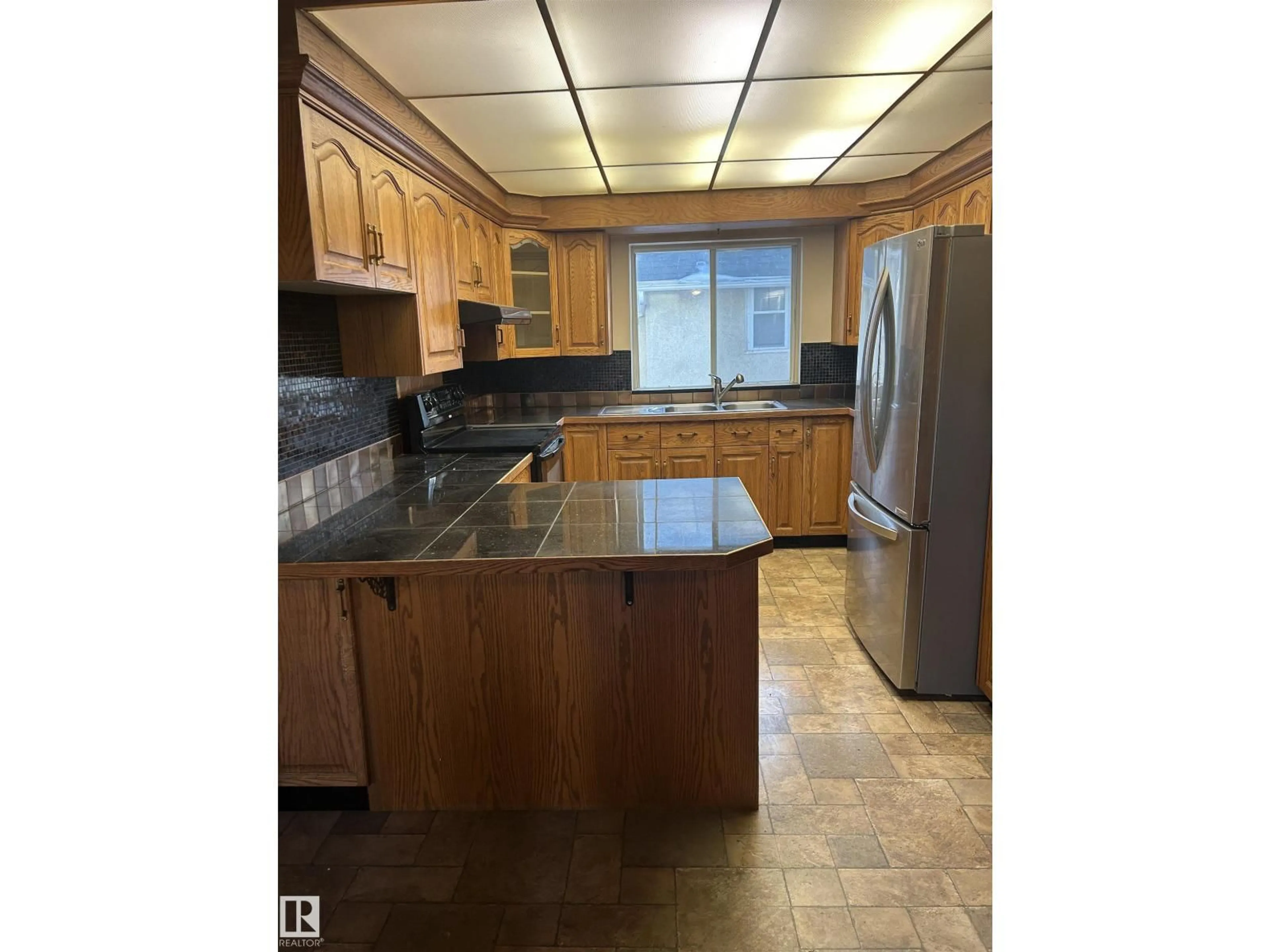 Standard kitchen, unknown for NW - 11243 125 STREET, Edmonton Alberta T5M0M6