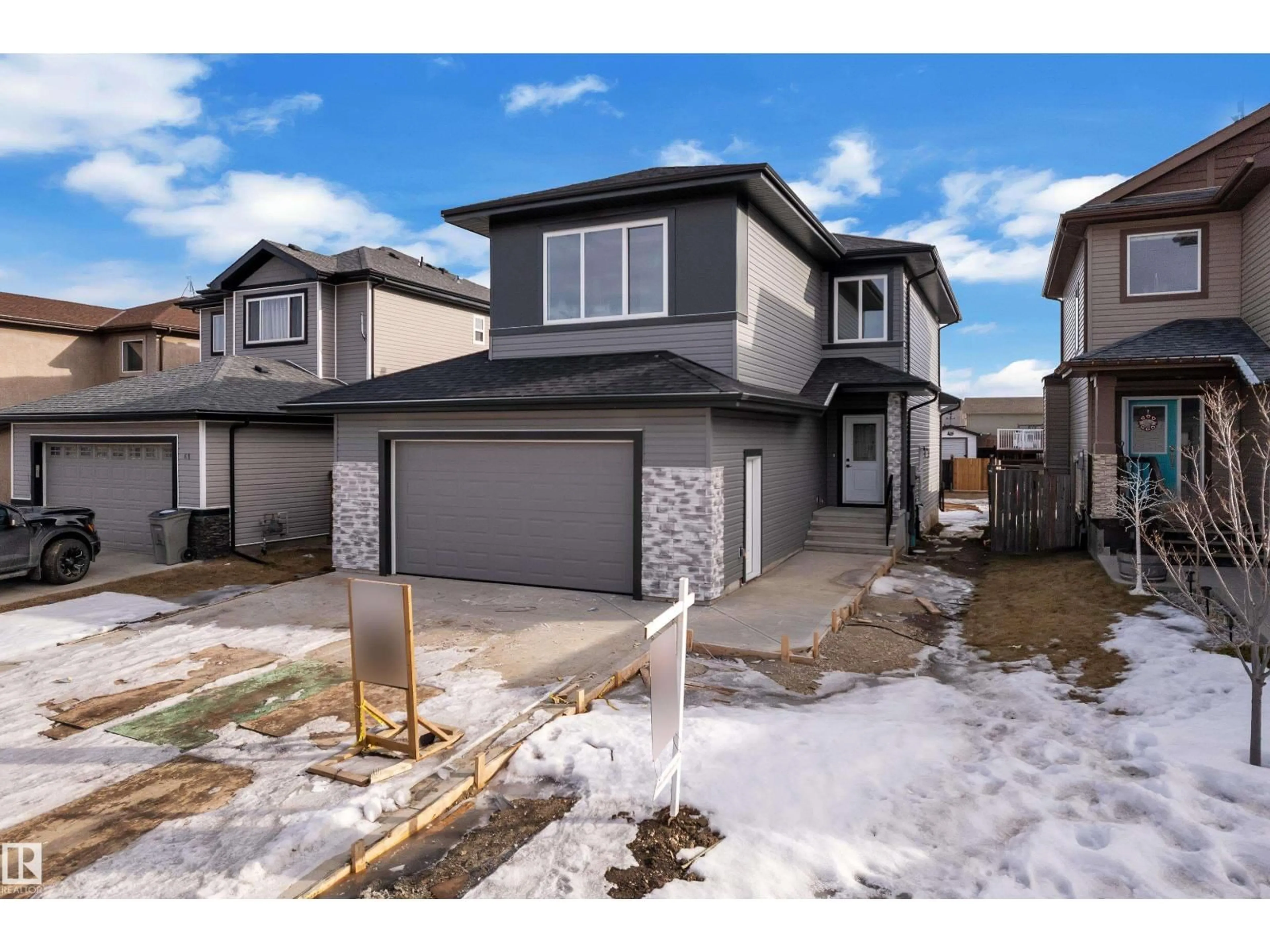 A pic from outside/outdoor area/front of a property/back of a property/a pic from drone, street for 39 SOUTHBRIDGE DR, Calmar Alberta T0C0V0