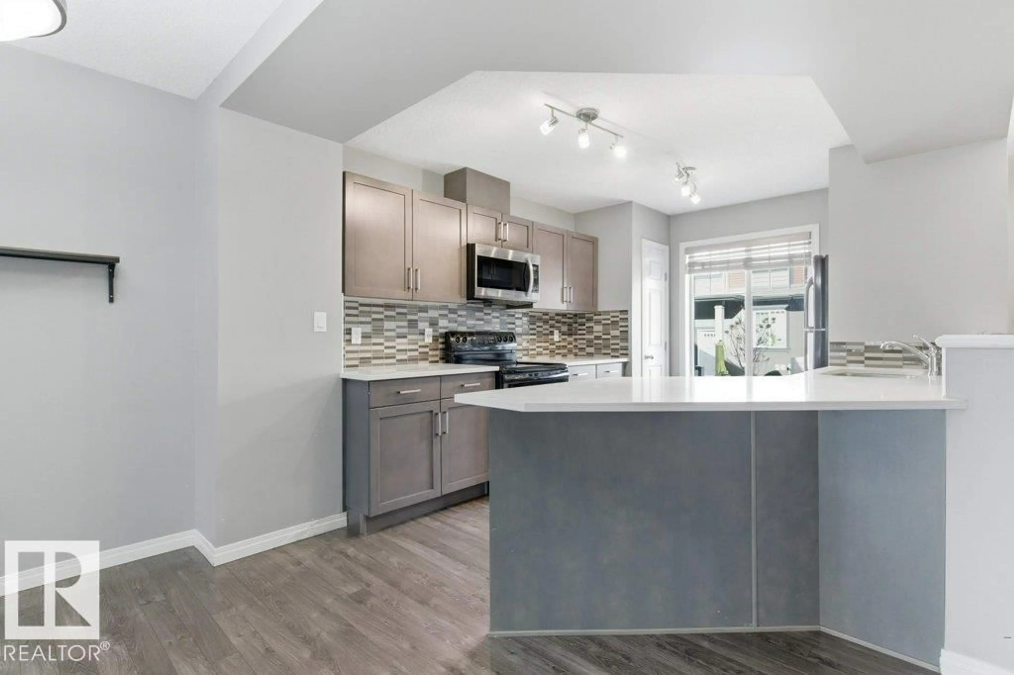 Open concept kitchen, unknown for #74 - 3305 ORCHARDS LI, Edmonton Alberta T6X2H1