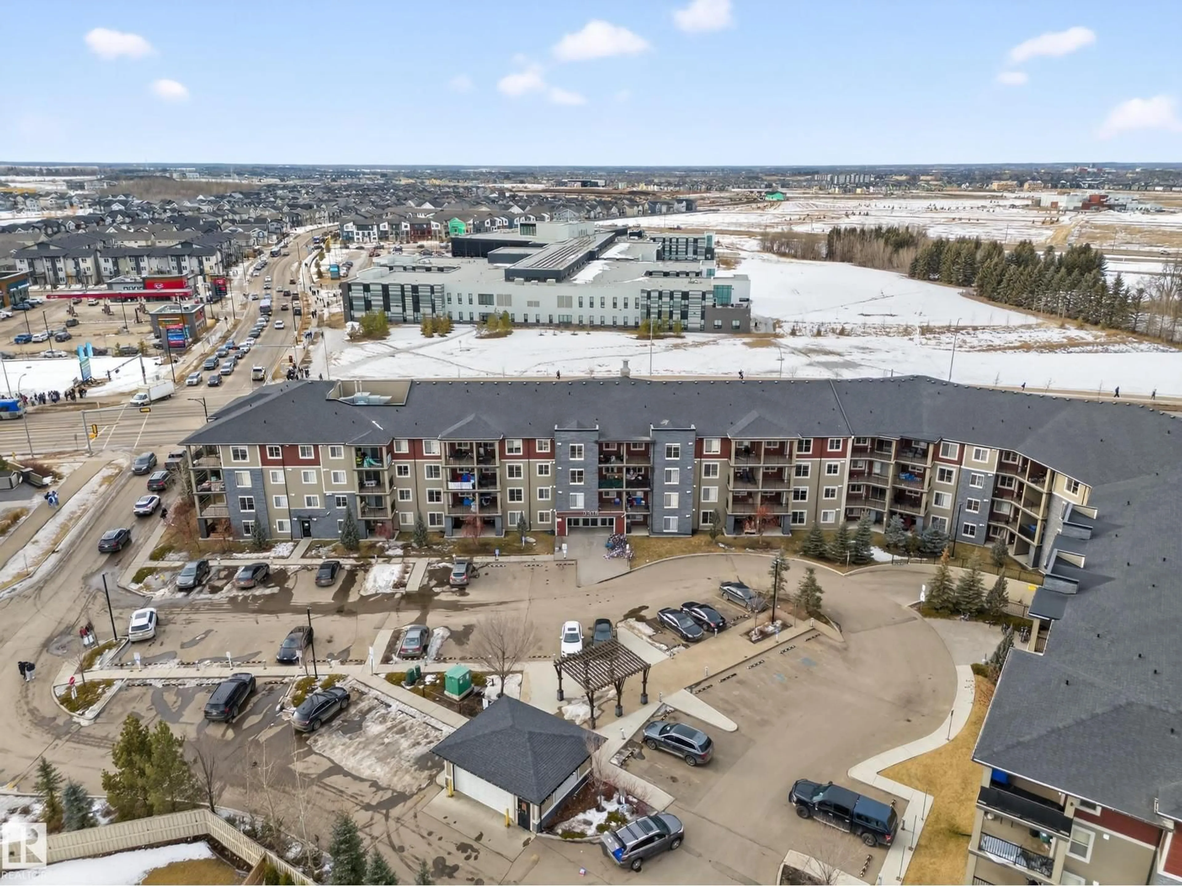 A pic from outside/outdoor area/front of a property/back of a property/a pic from drone, city buildings view from balcony for #412 - 3315 JAMES MOWATT TRAIL, Edmonton Alberta T6W3L9