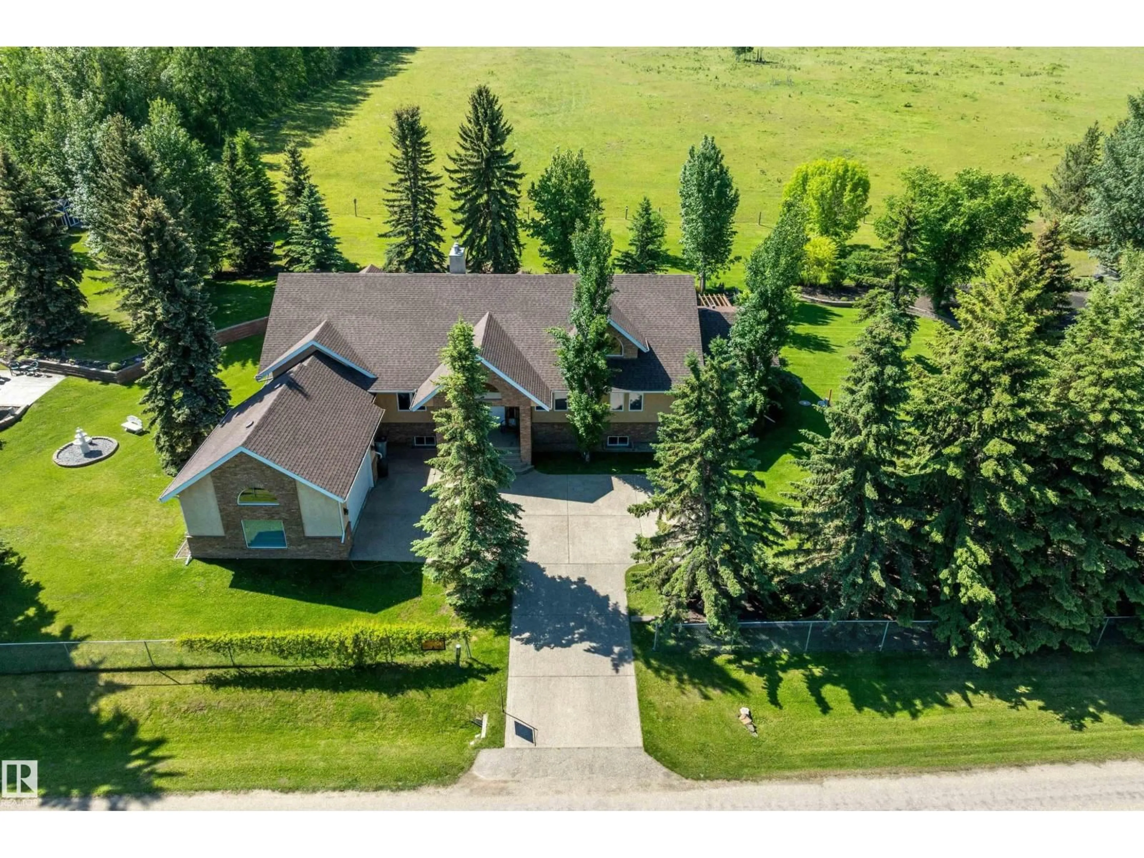 A pic from outside/outdoor area/front of a property/back of a property/a pic from drone, unknown for 248 LAKESHORE DR, Rural Wetaskiwin County Alberta T0C2V0