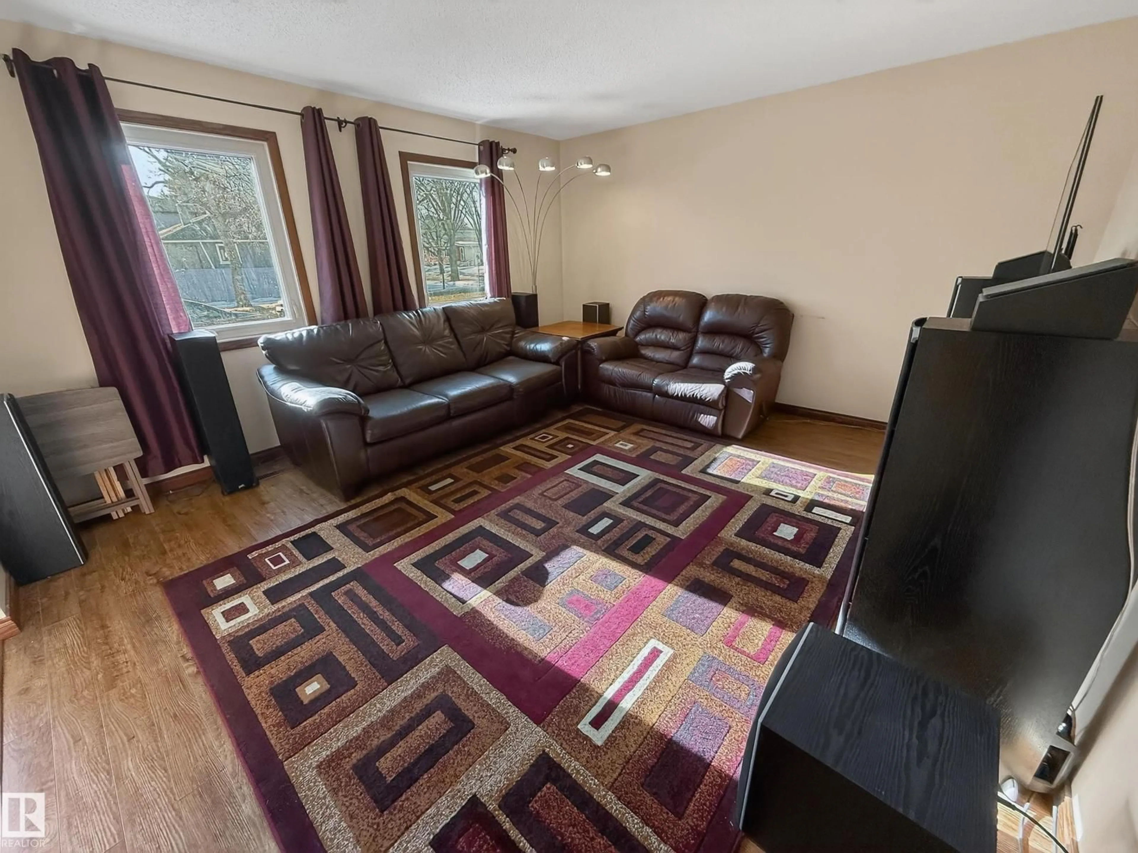 Living room with furniture, unknown for NW - 8316 122 AV, Edmonton Alberta T5B4M7