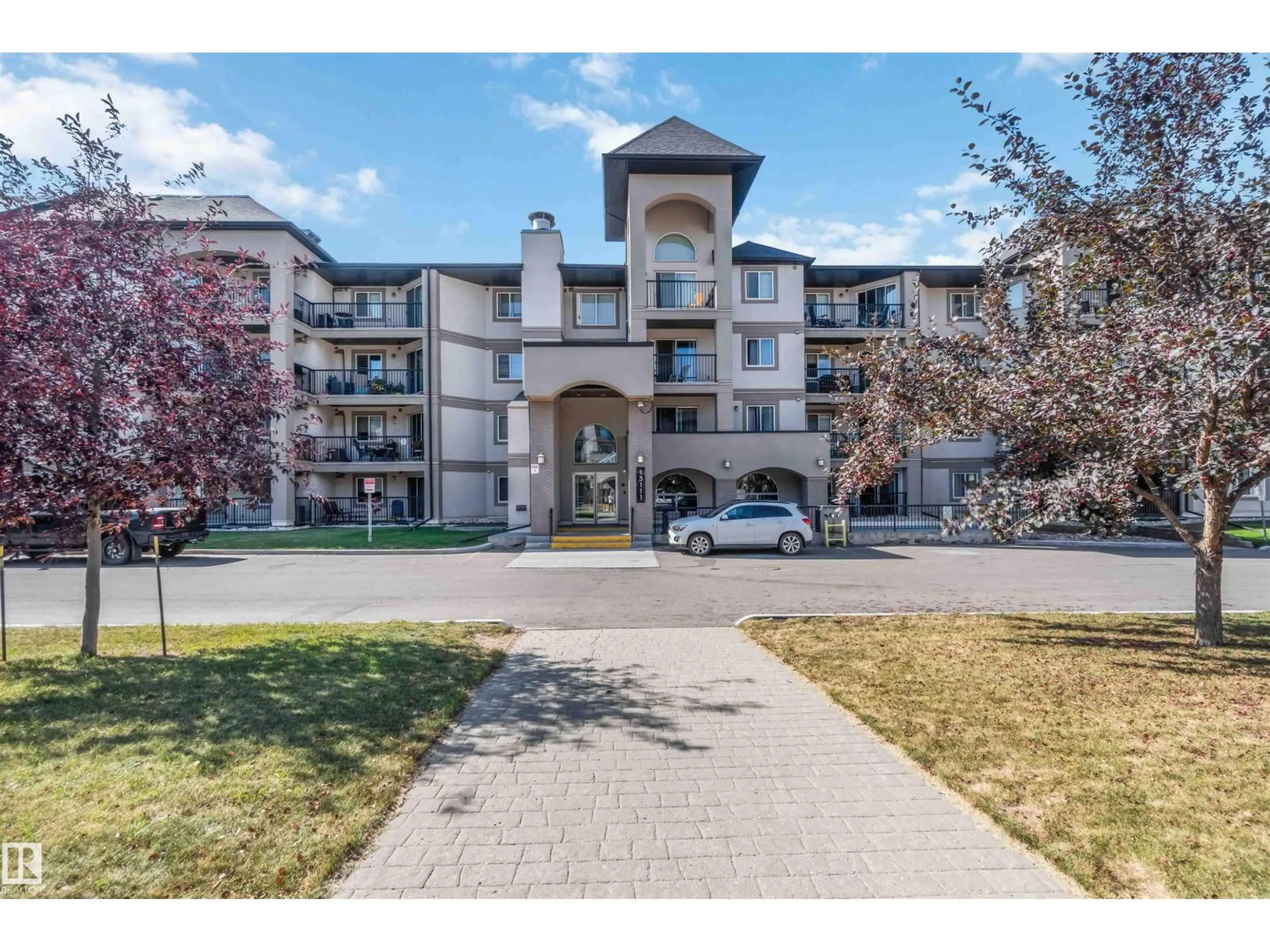 A pic from outside/outdoor area/front of a property/back of a property/a pic from drone, unknown for 210 13111 140 AV NW, Edmonton Alberta T6V0B1