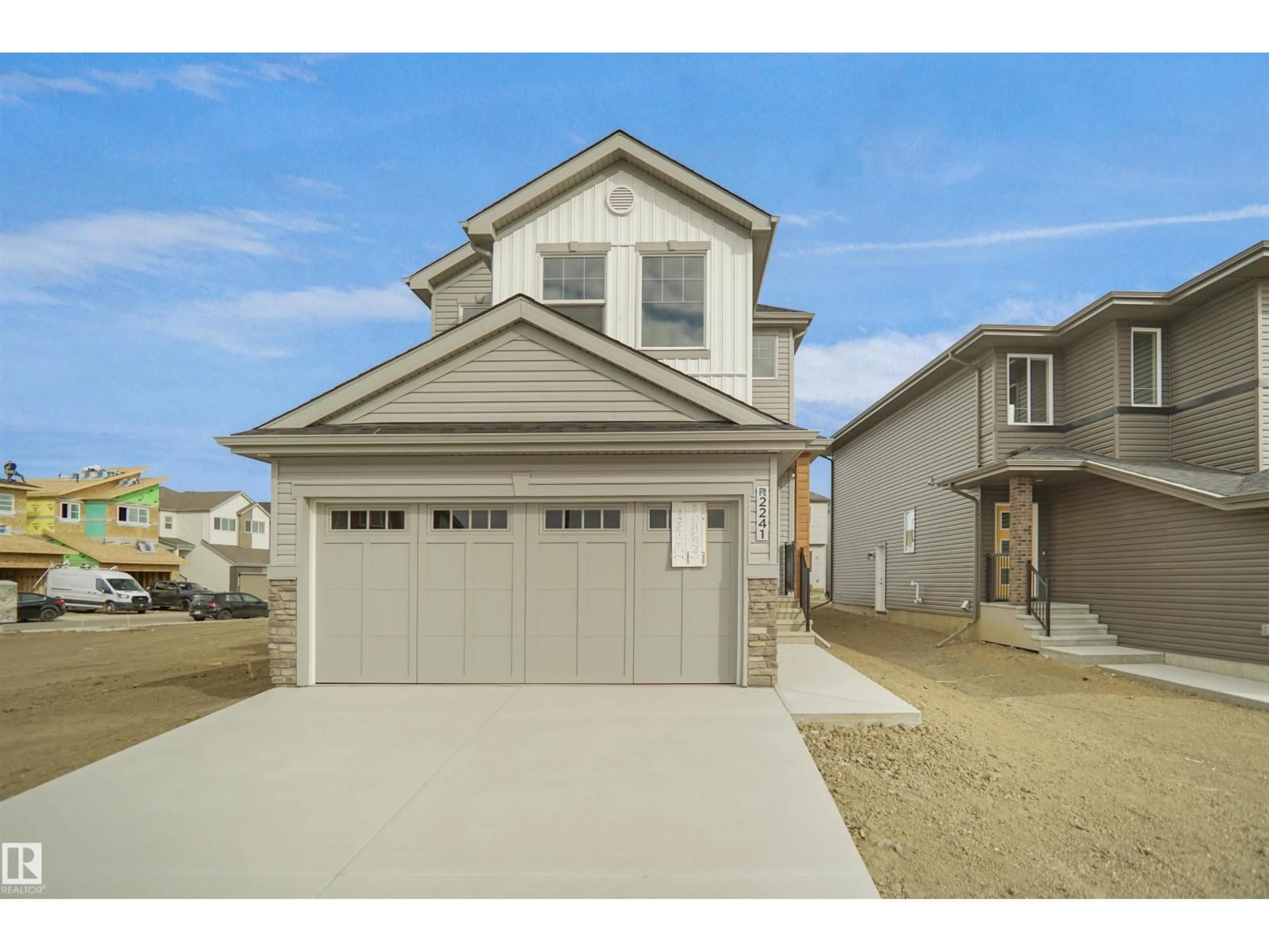 Home with vinyl exterior material, street for NW - 2241 194A ST, Edmonton Alberta T6M1P7