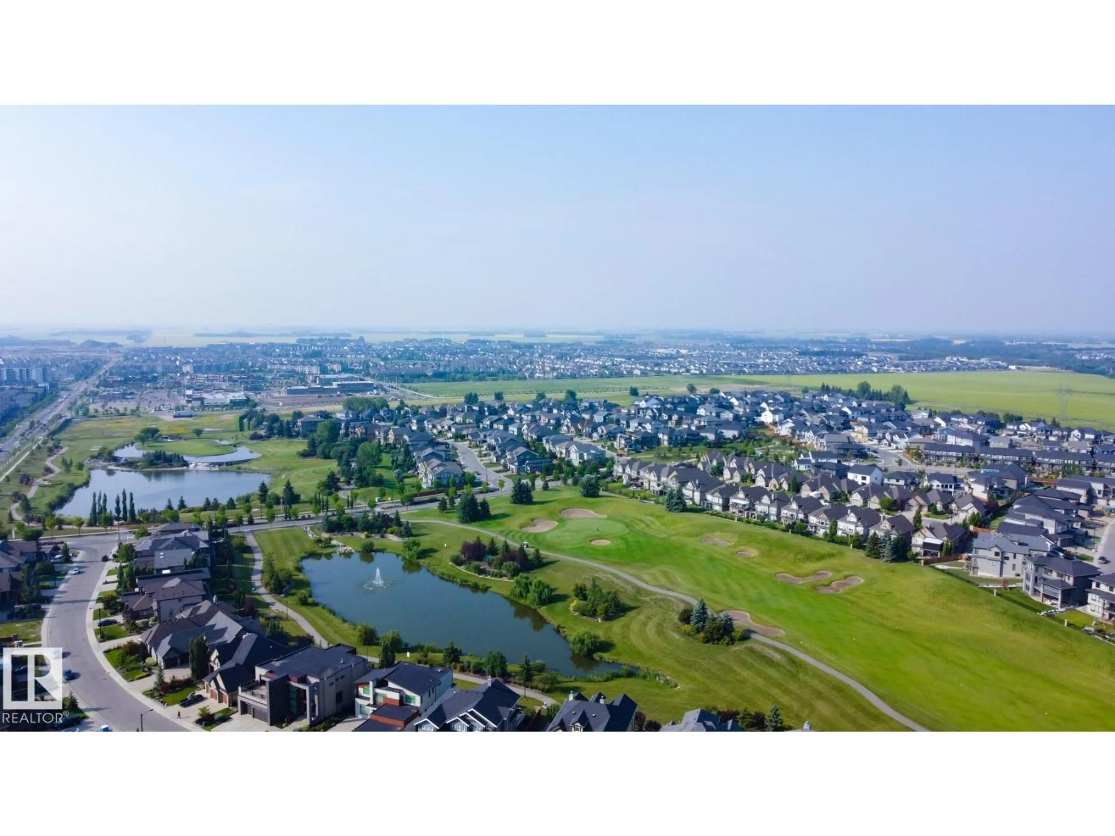 A pic from outside/outdoor area/front of a property/back of a property/a pic from drone, water/lake/river/ocean view for 1025 HUCKELL PL, Edmonton Alberta T6W3B7