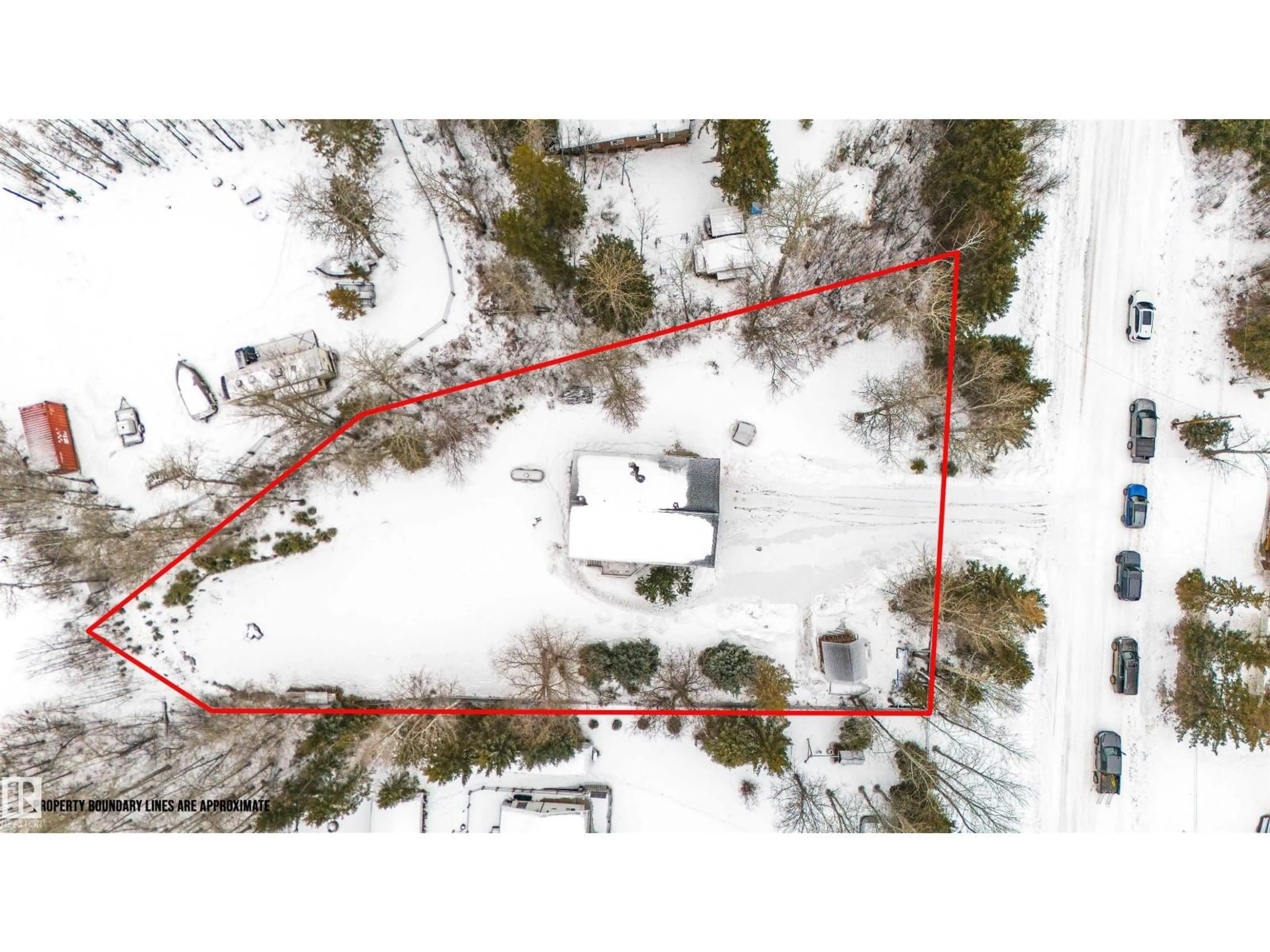 A pic from outside/outdoor area/front of a property/back of a property/a pic from drone, street for #11 - 6020 TWP ROAD 534, Rural Parkland County Alberta T0E0W0