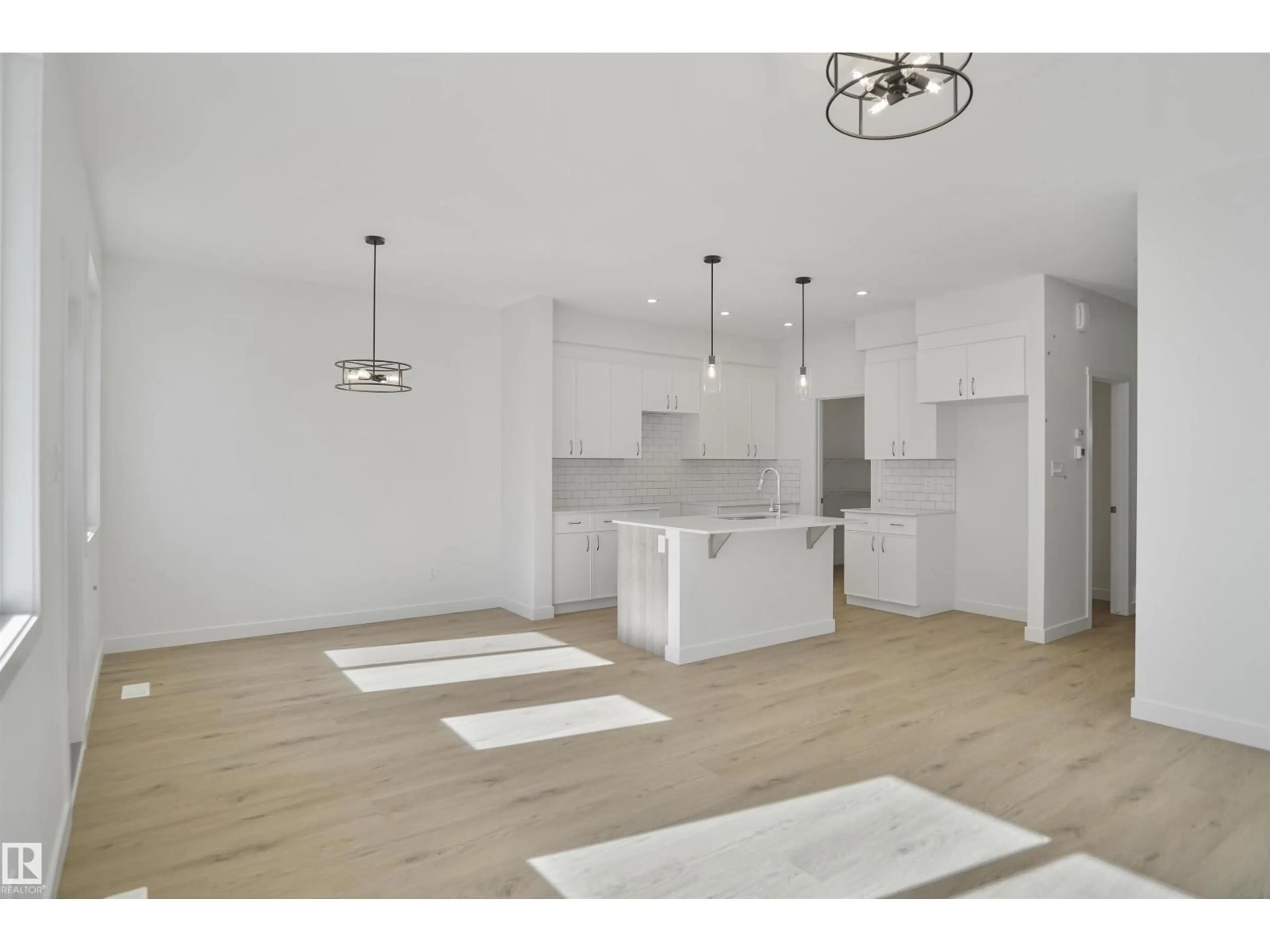 Open concept kitchen, unknown for 8464 183 AV, Edmonton Alberta T5Z0L5