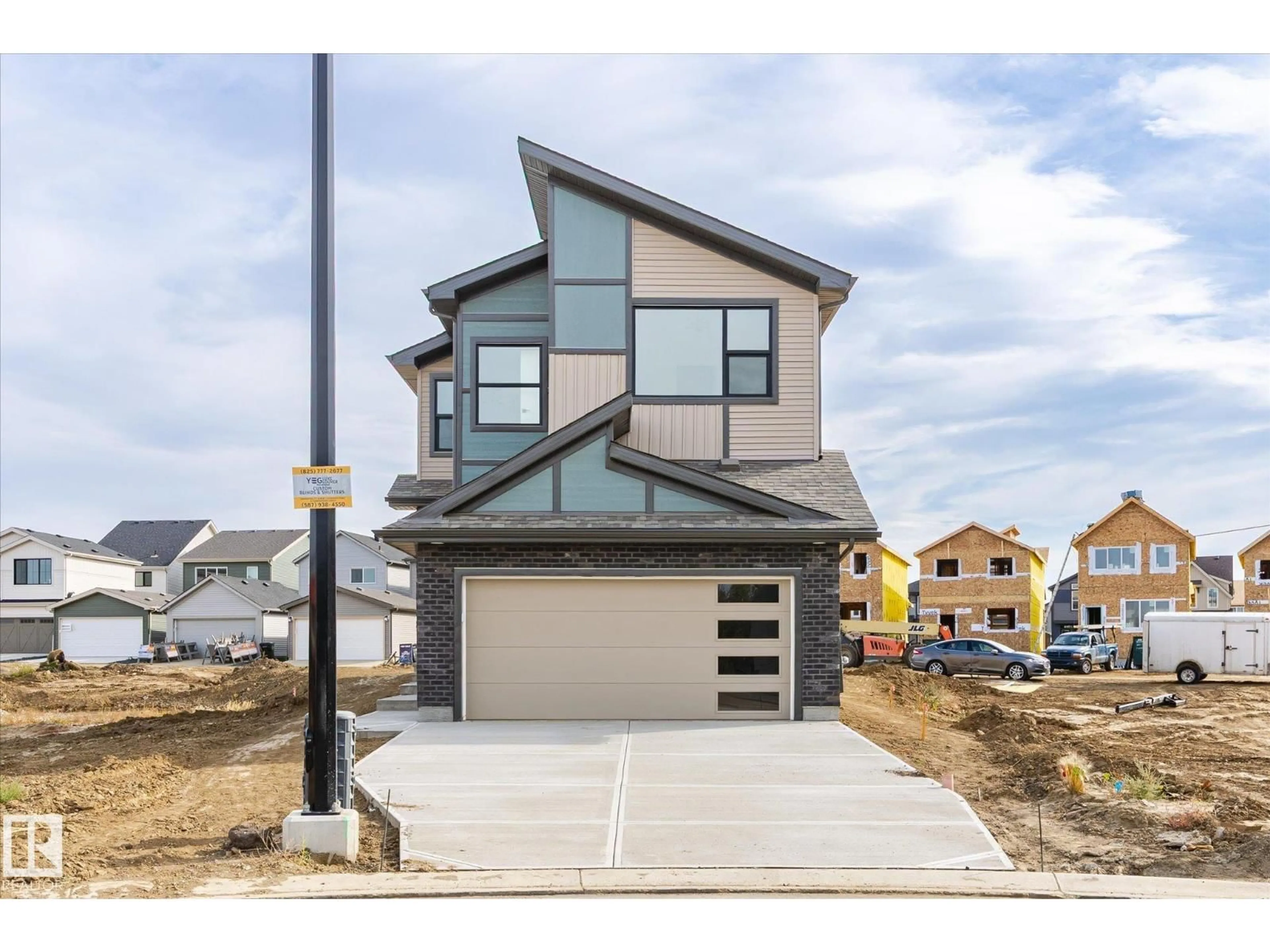 Home with vinyl exterior material, street for NW - 22607 89 AV, Edmonton Alberta T5T7W8