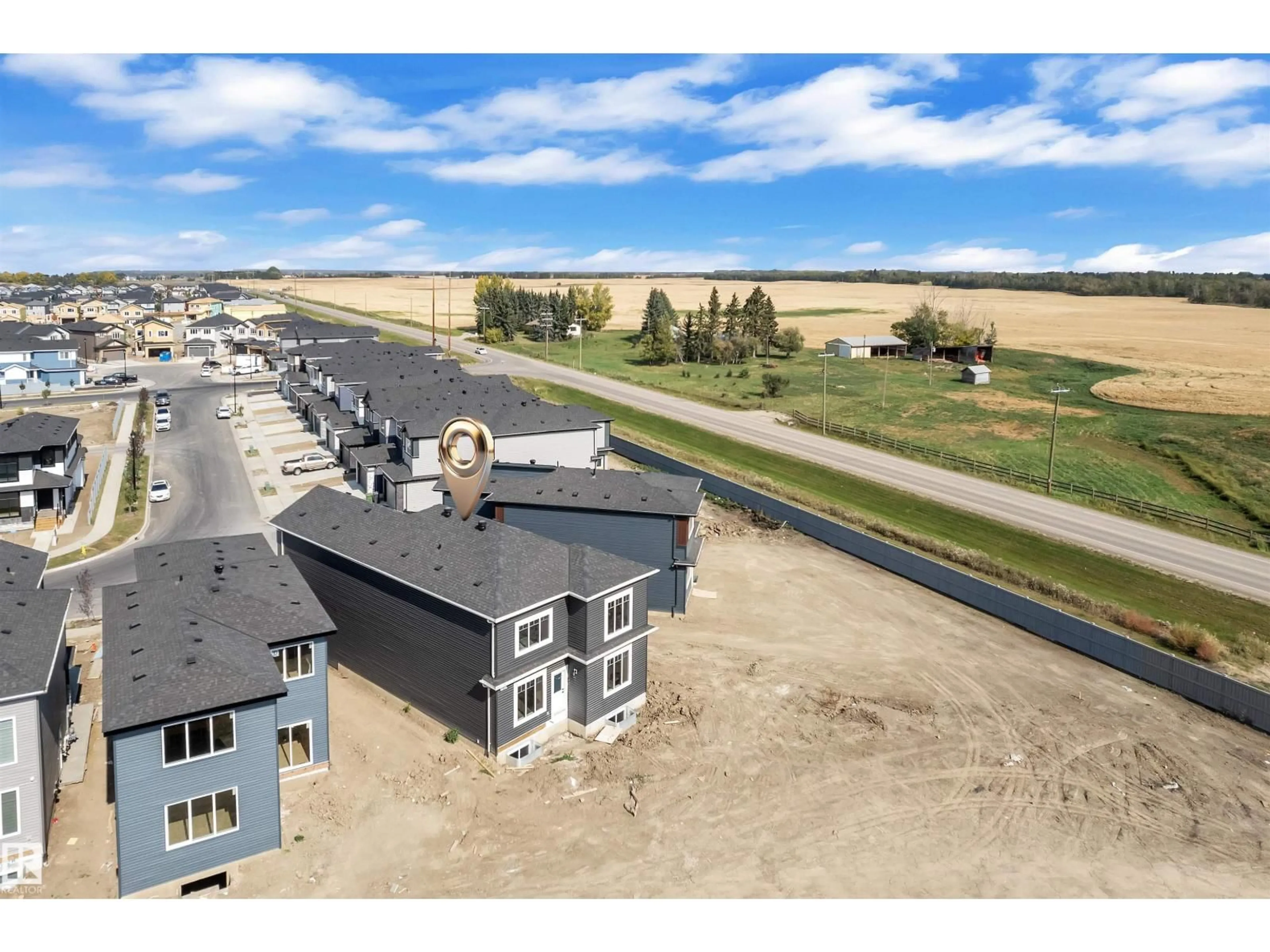 A pic from outside/outdoor area/front of a property/back of a property/a pic from drone, water/lake/river/ocean view for 3503 42 AV, Beaumont Alberta T4X3G4