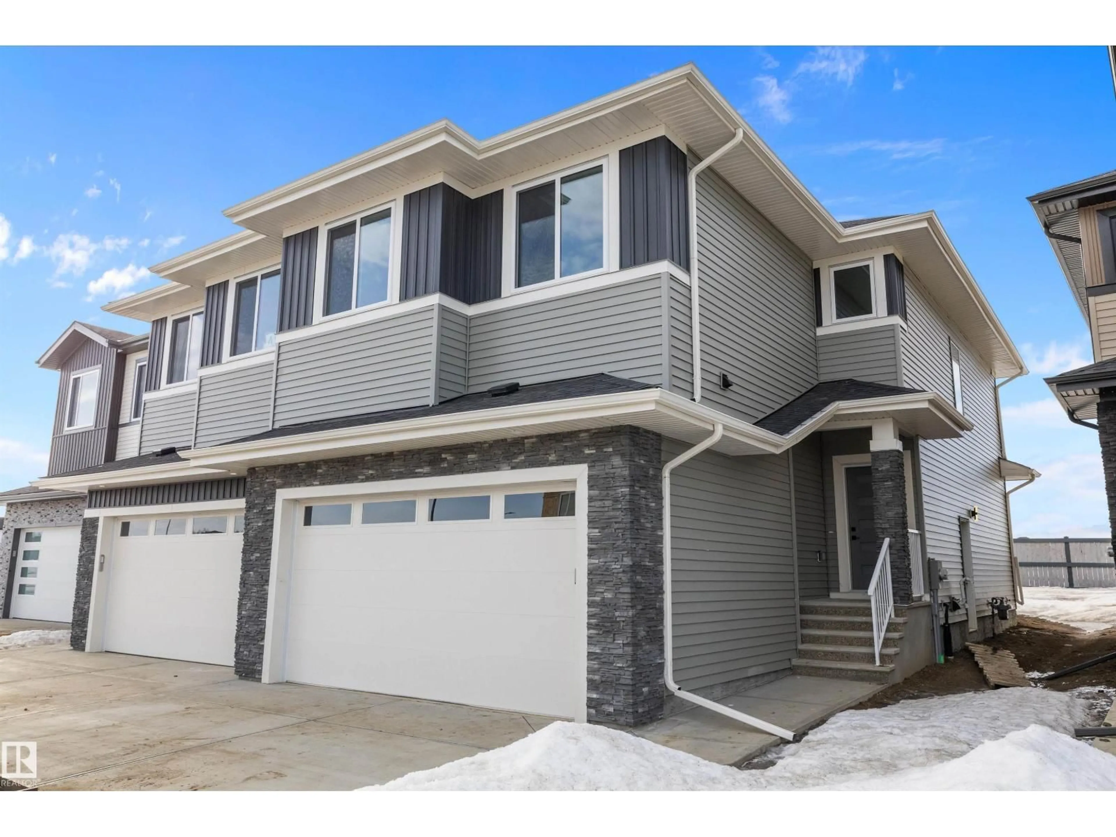 Home with vinyl exterior material, street for 6 AXELWOOD CR, Spruce Grove Alberta T7X4G4