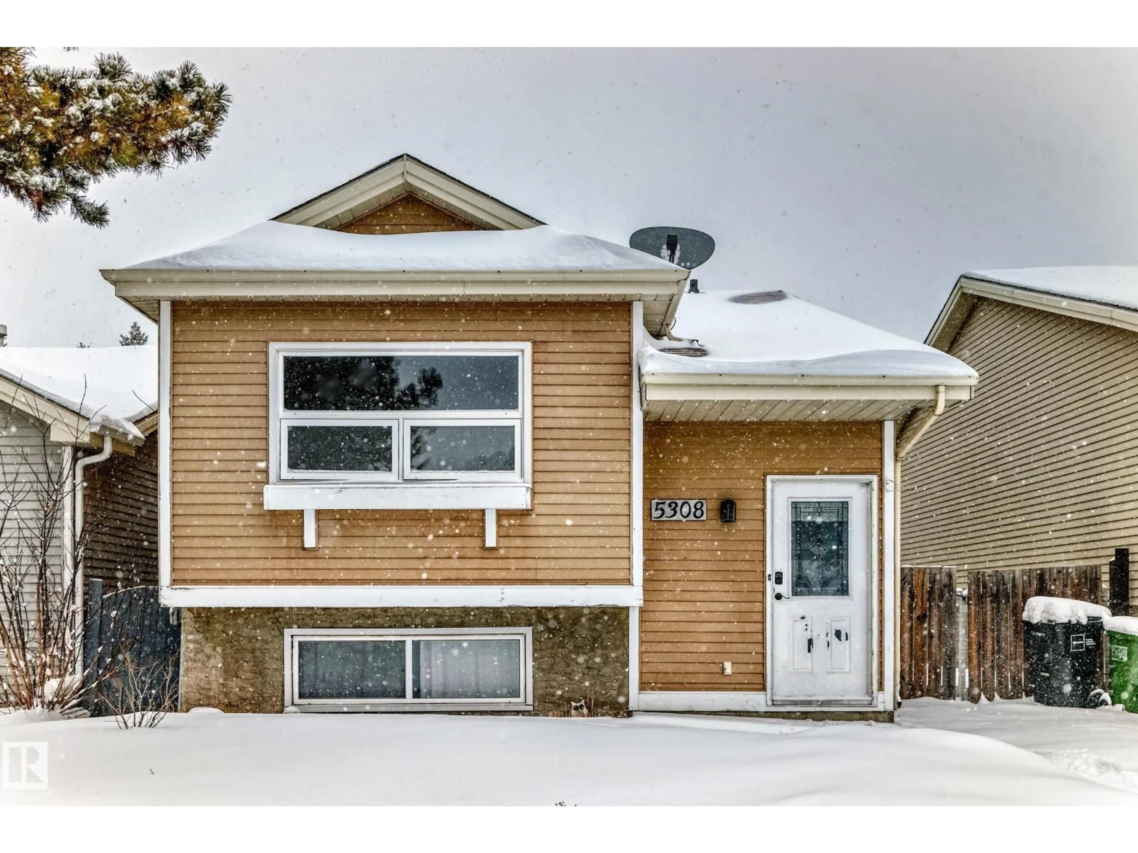 Home with vinyl exterior material, street for 5308 20 AV, Edmonton Alberta T6L5J3