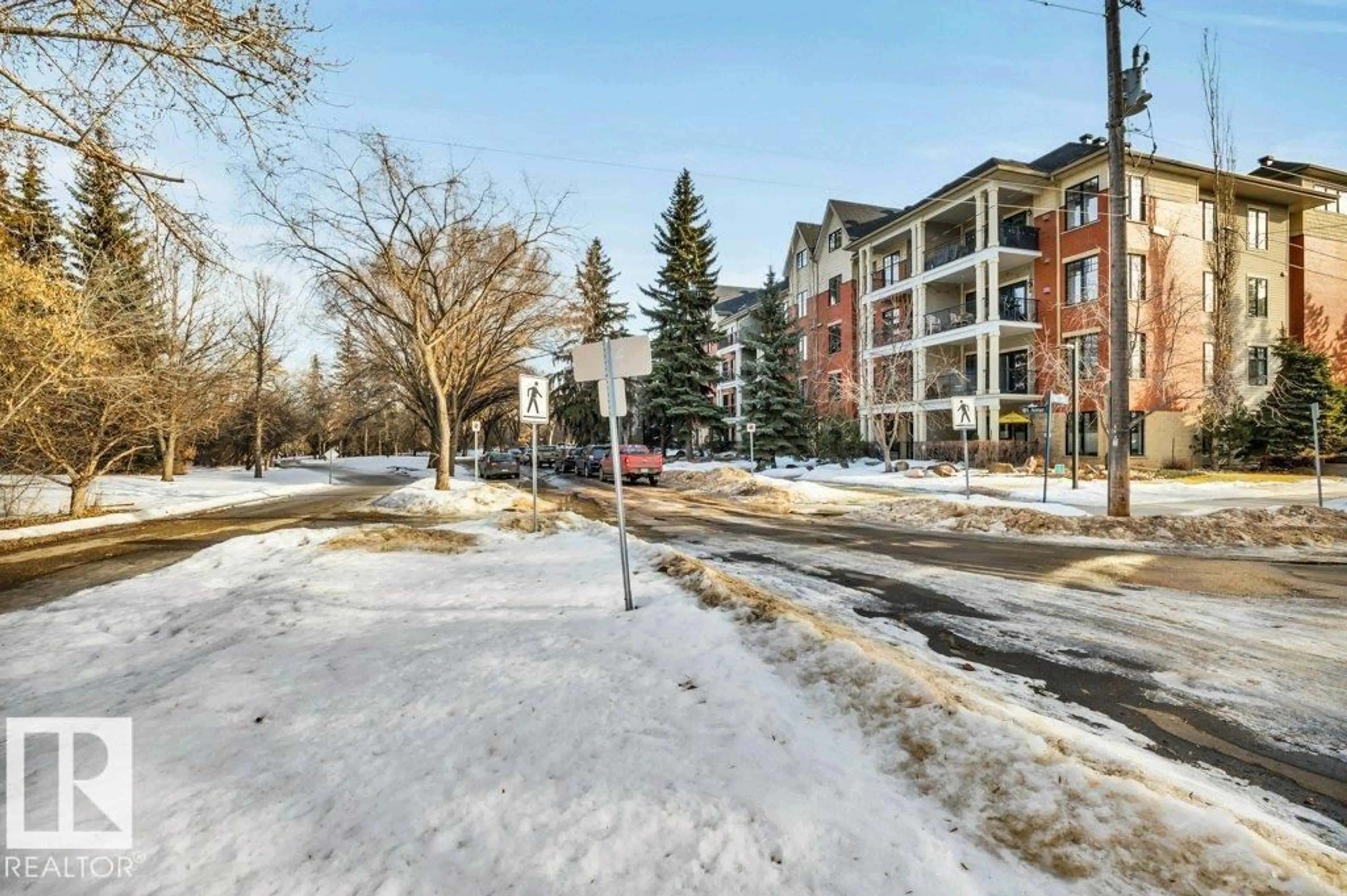 A pic from outside/outdoor area/front of a property/back of a property/a pic from drone, street for 201 - 9819 96A ST NW, Edmonton Alberta T6A4A2