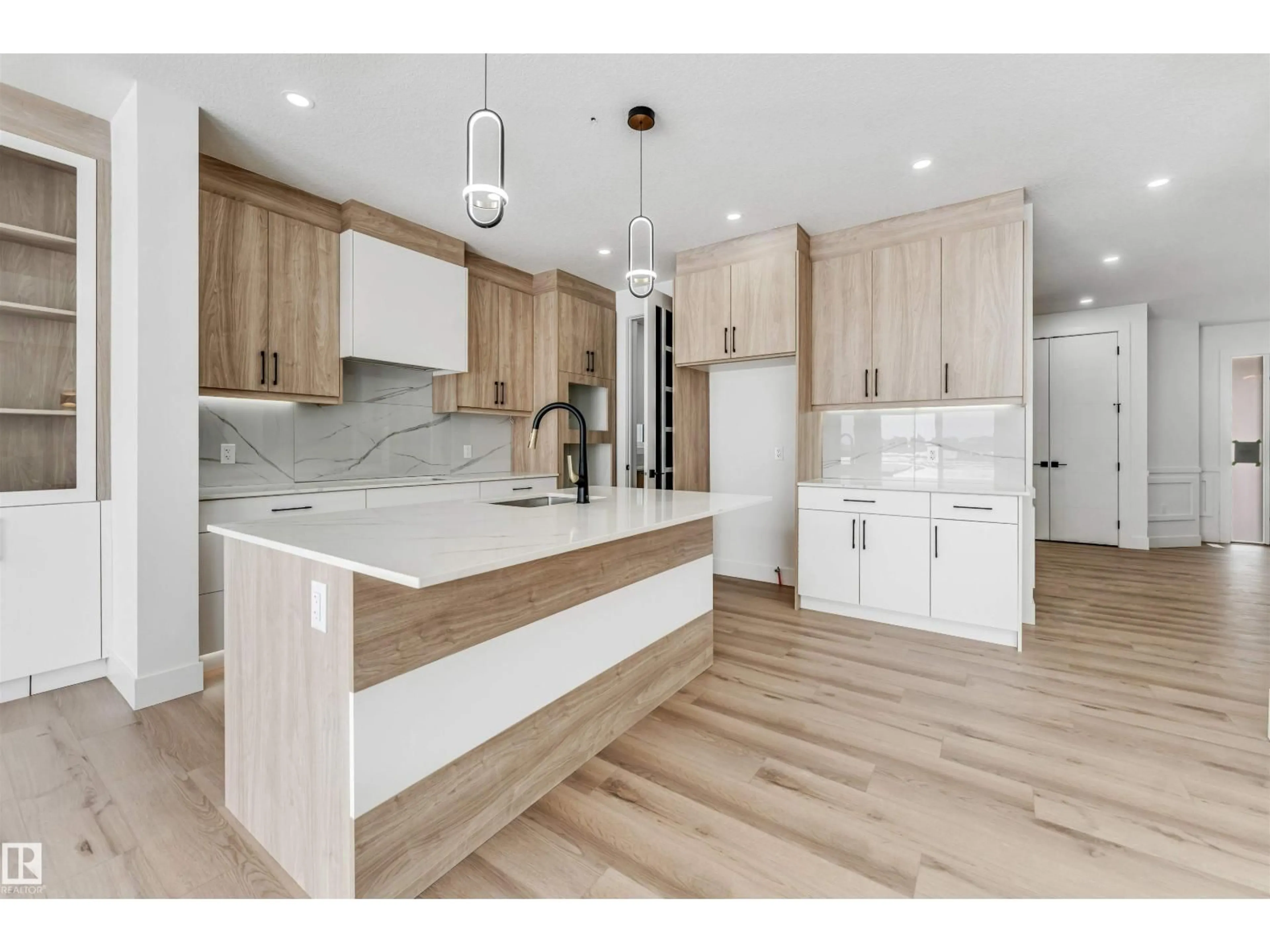 Open concept kitchen, wood/laminate floor for NE - 6251 19 ST, Rural Leduc County Alberta T4X3C8