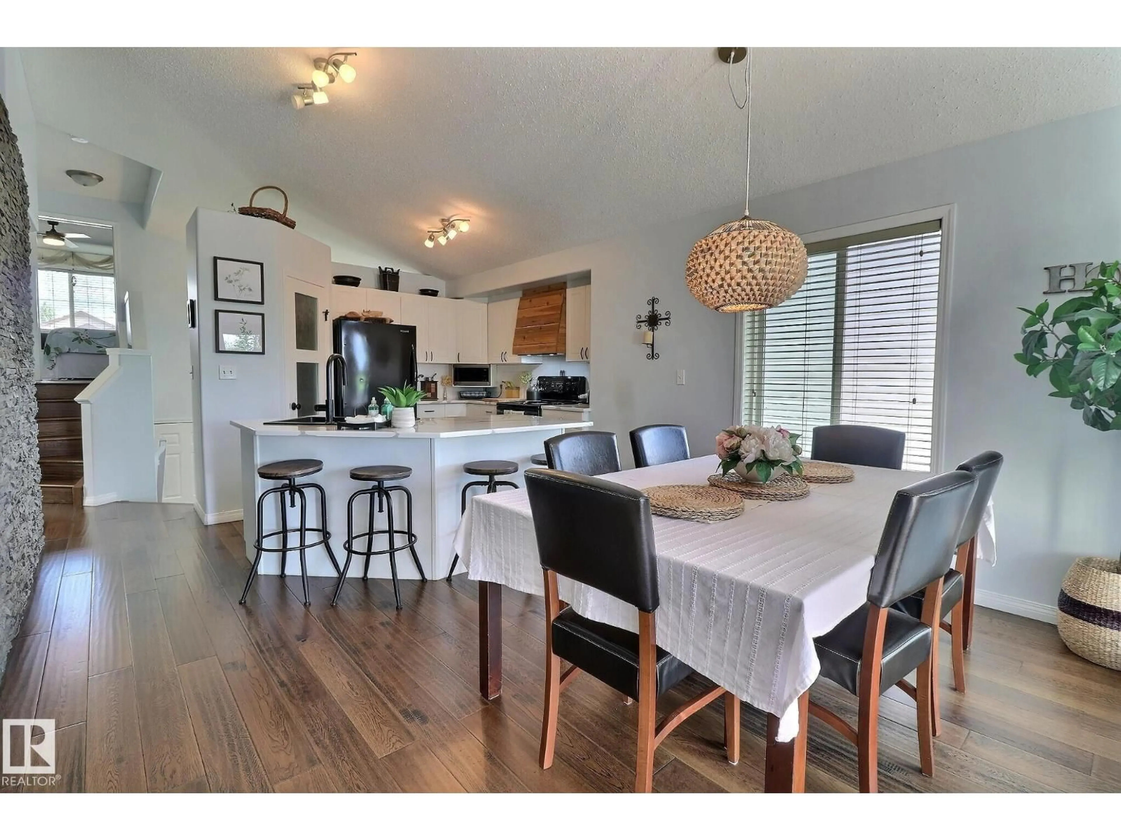 Open concept kitchen, wood/laminate floor for 4343 MCMULLEN WY, Edmonton Alberta T6W1N5