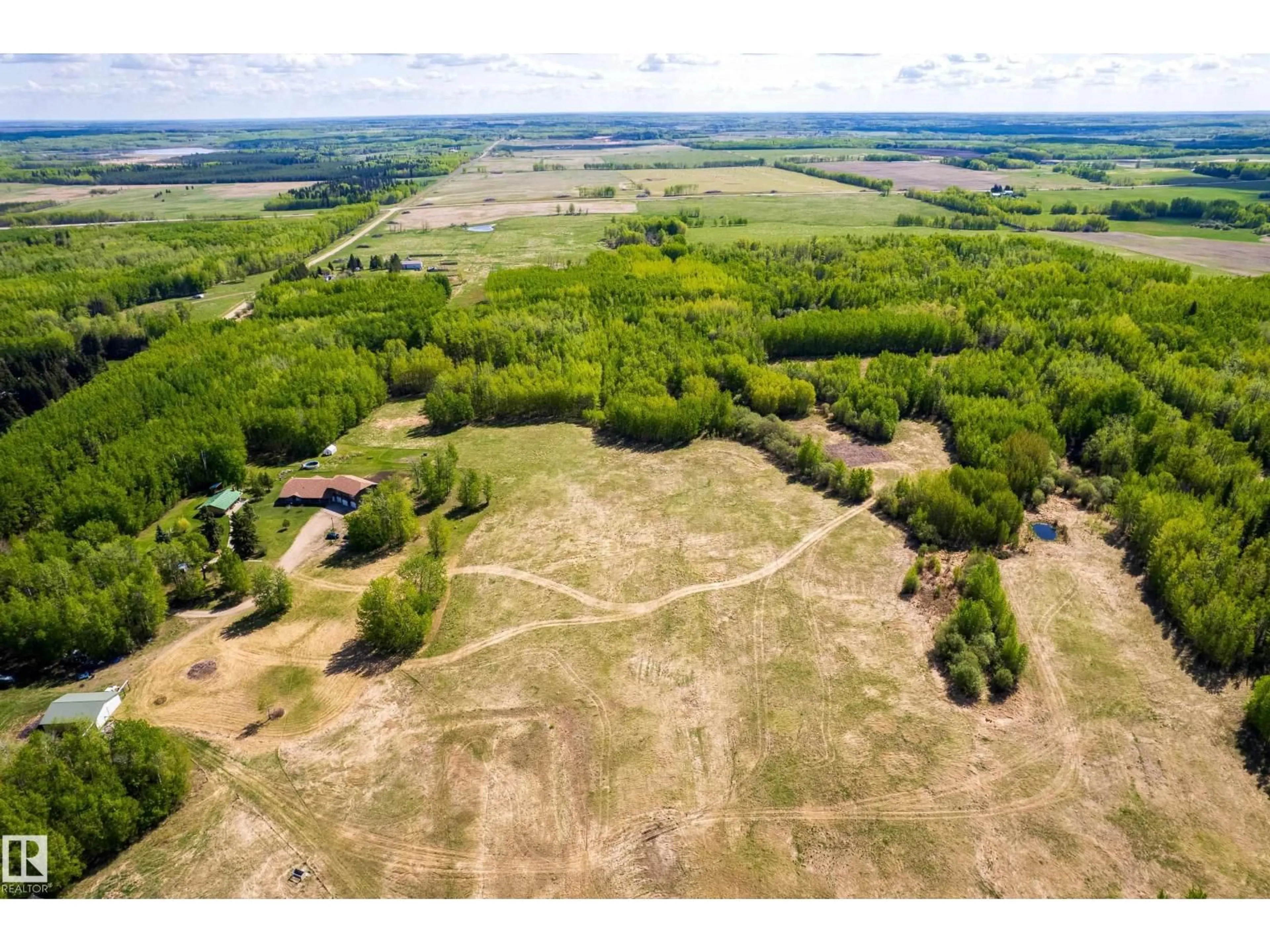 A pic from outside/outdoor area/front of a property/back of a property/a pic from drone, unknown for 6521 TWP RD 554, Rural Lac Ste. Anne County Alberta T0E2A0