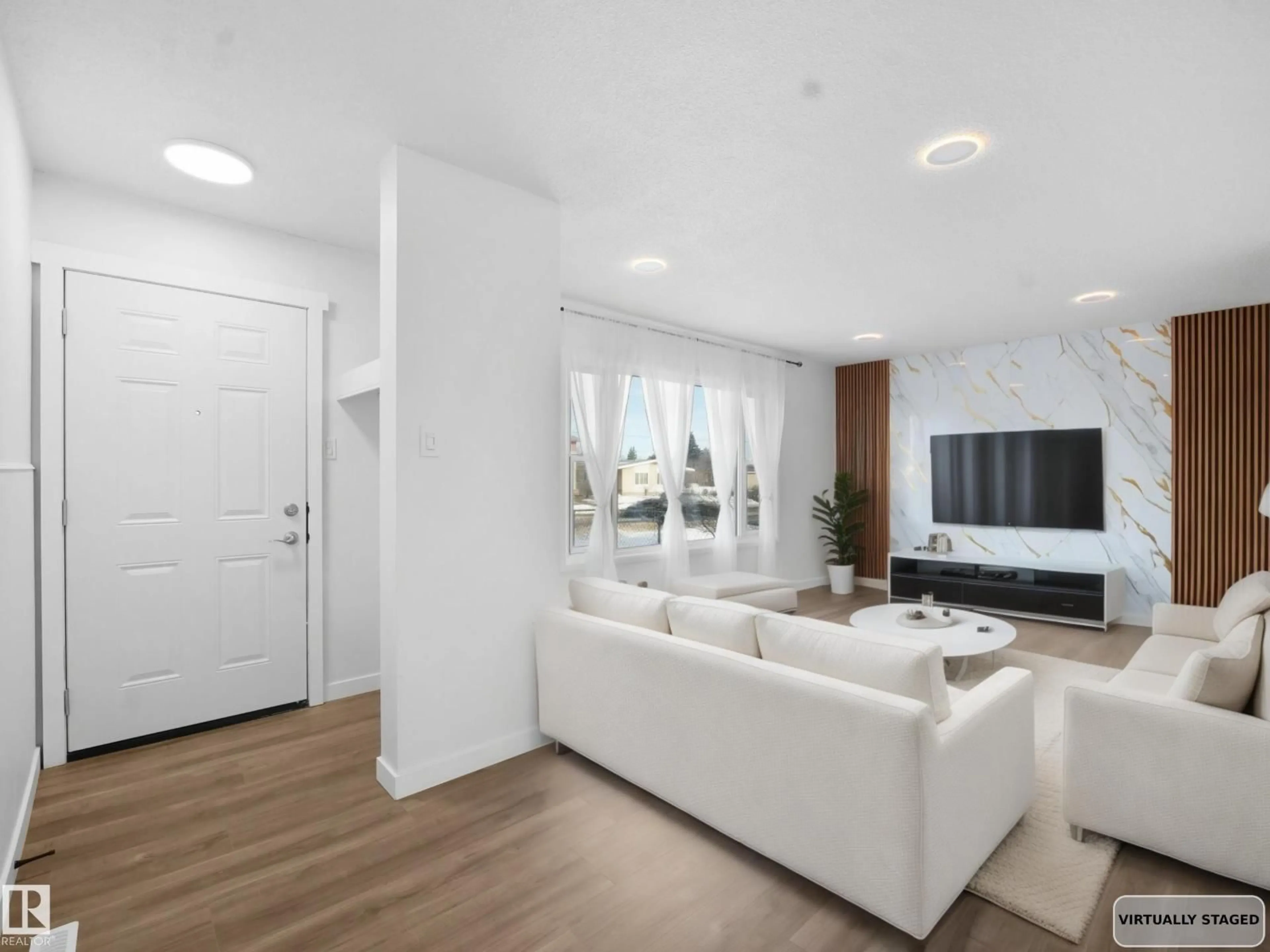 Living room with furniture, unknown for 10329 132 AV, Edmonton Alberta T5E0Y8