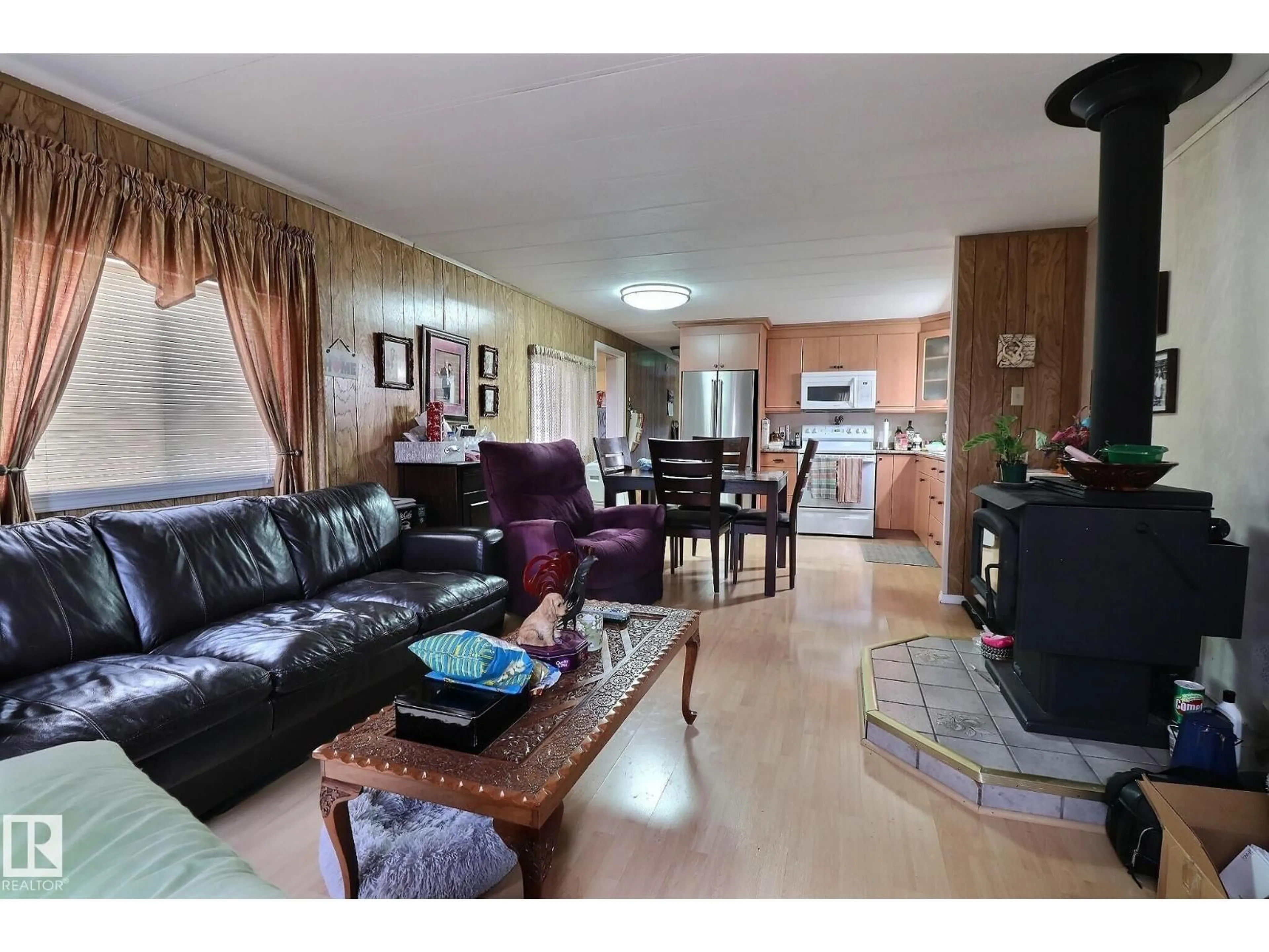 Living room with furniture, wood/laminate floor for NW - 290 JUNIPER CR, Edmonton Alberta T5Y6L6