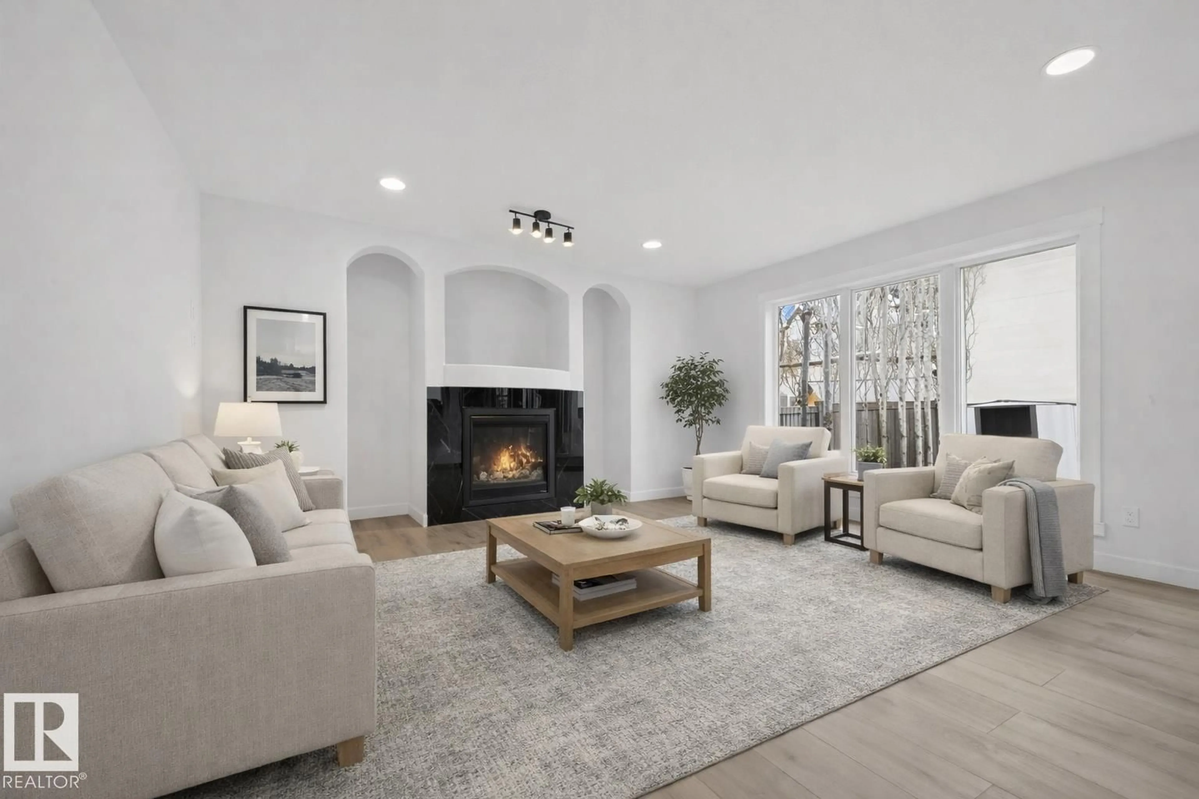 Living room with furniture, ceramic/tile floor for NW - 10916 175 AV, Edmonton Alberta T5Y0B7