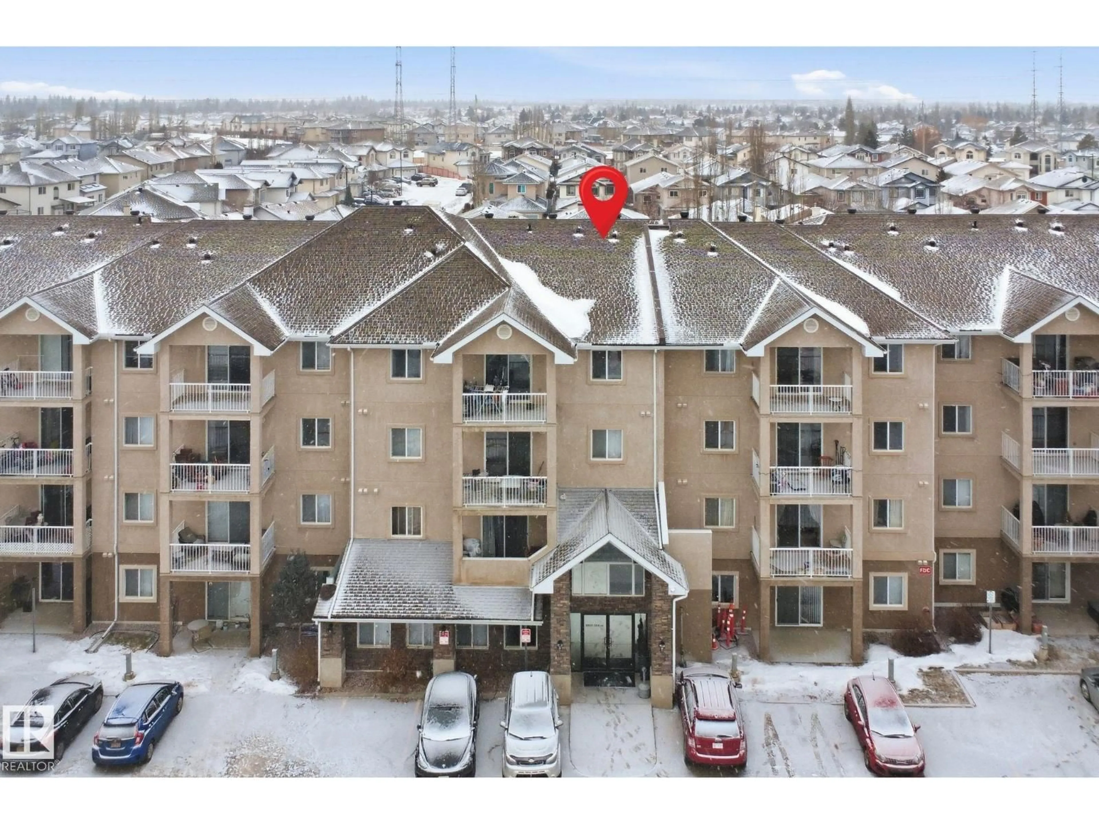 A pic from outside/outdoor area/front of a property/back of a property/a pic from drone, unknown for #407 - 2305 35A AV, Edmonton Alberta T6T1Z2