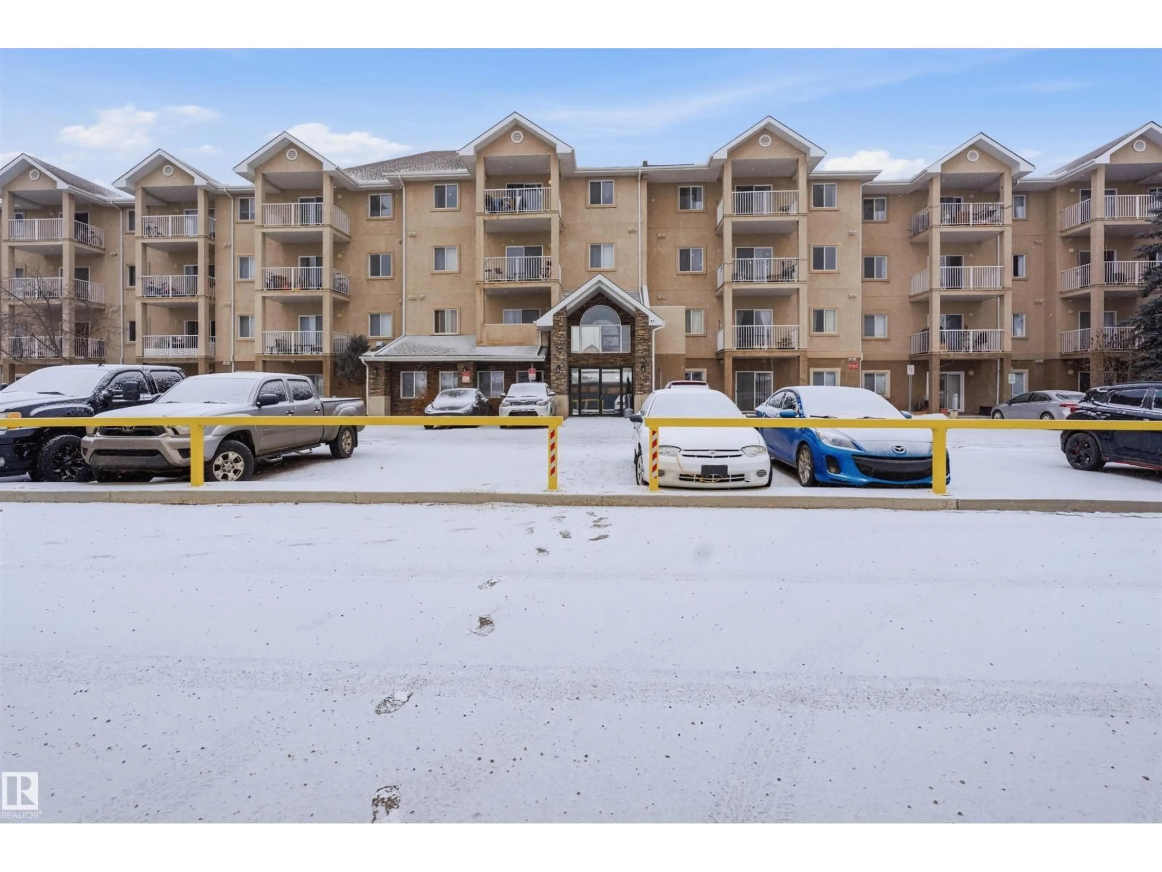 A pic from outside/outdoor area/front of a property/back of a property/a pic from drone, mountain view for #407 - 2305 35A AV, Edmonton Alberta T6T1Z2