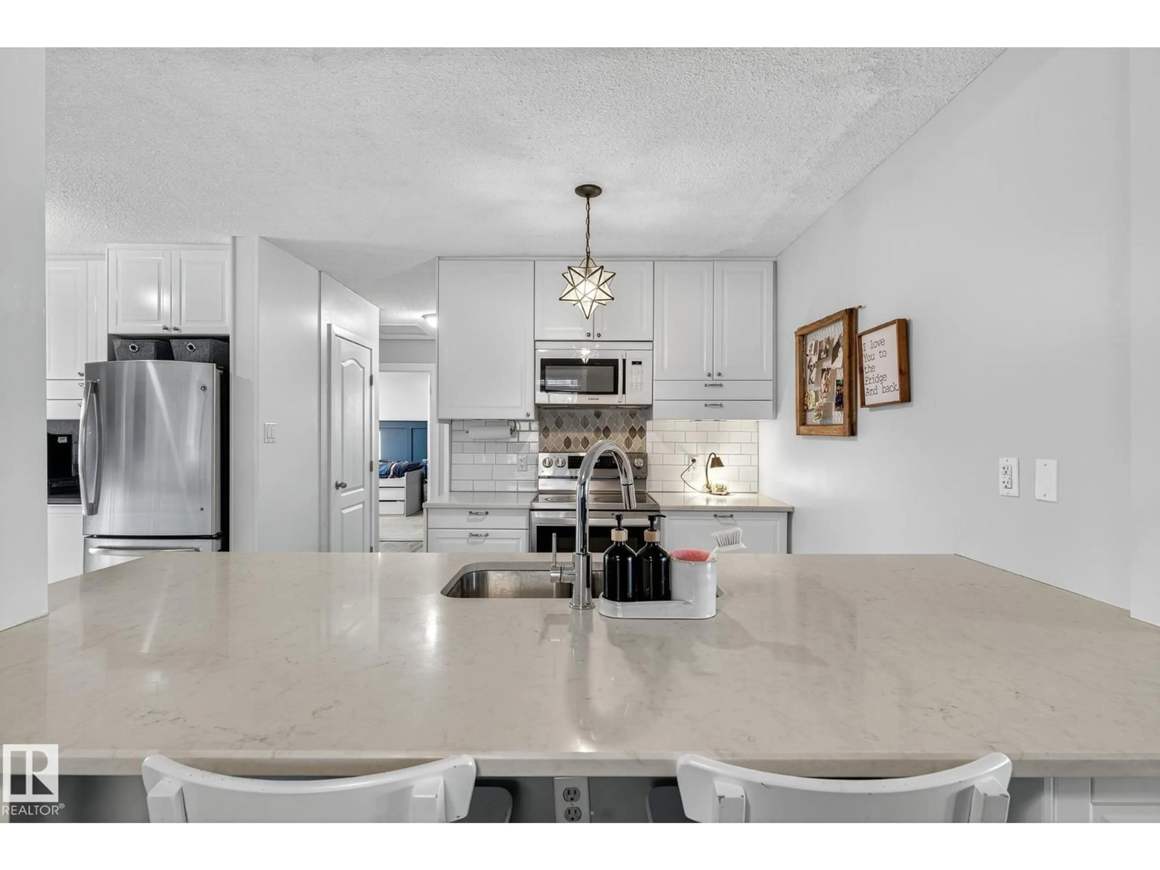 Open concept kitchen, ceramic/tile floor for 26 WOODFIELD DR, Sherwood Park Alberta T8A4A3