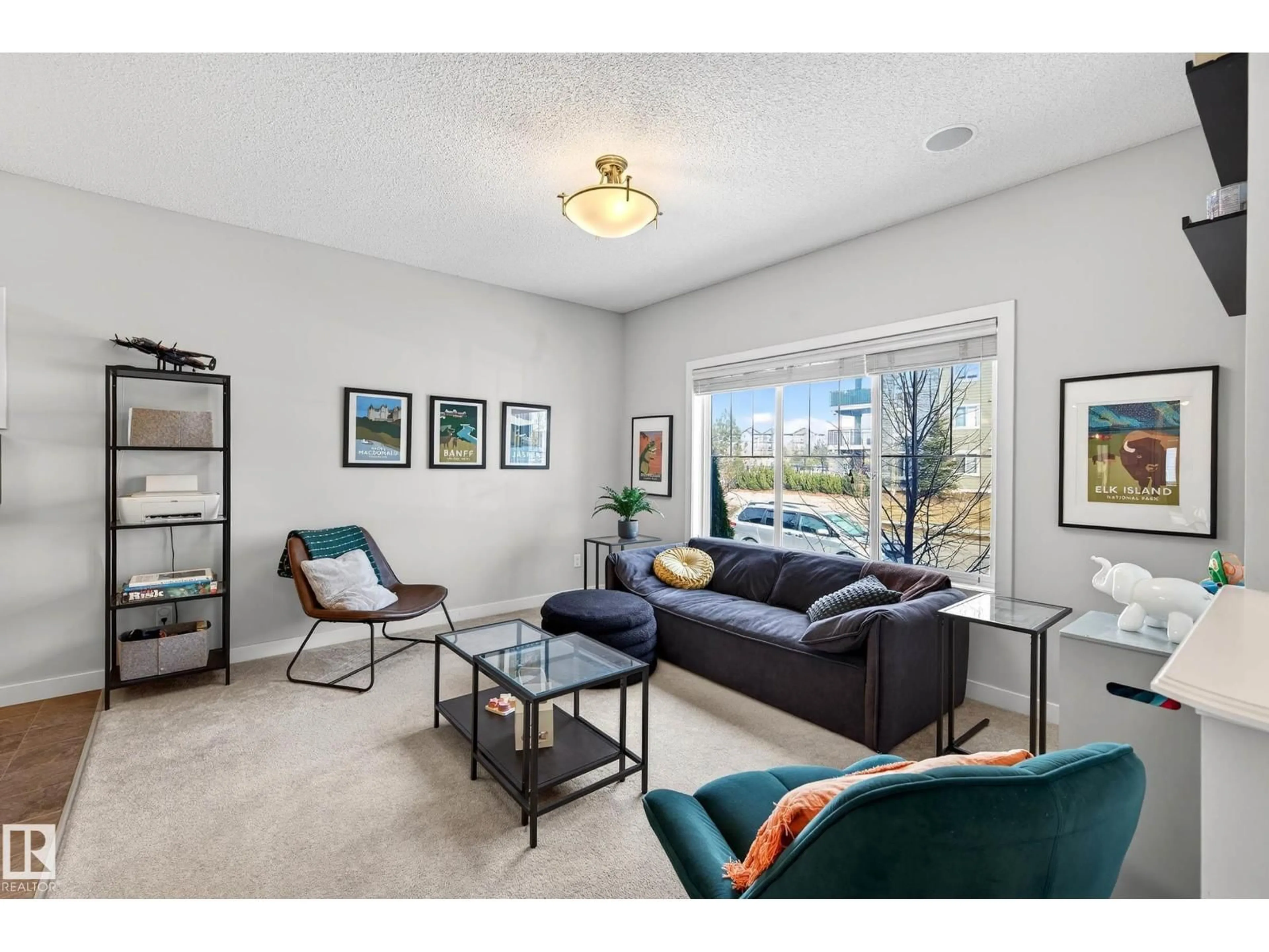 Living room with furniture, unknown for 285 MCCONACHIE DR, Edmonton Alberta T5Y0M7