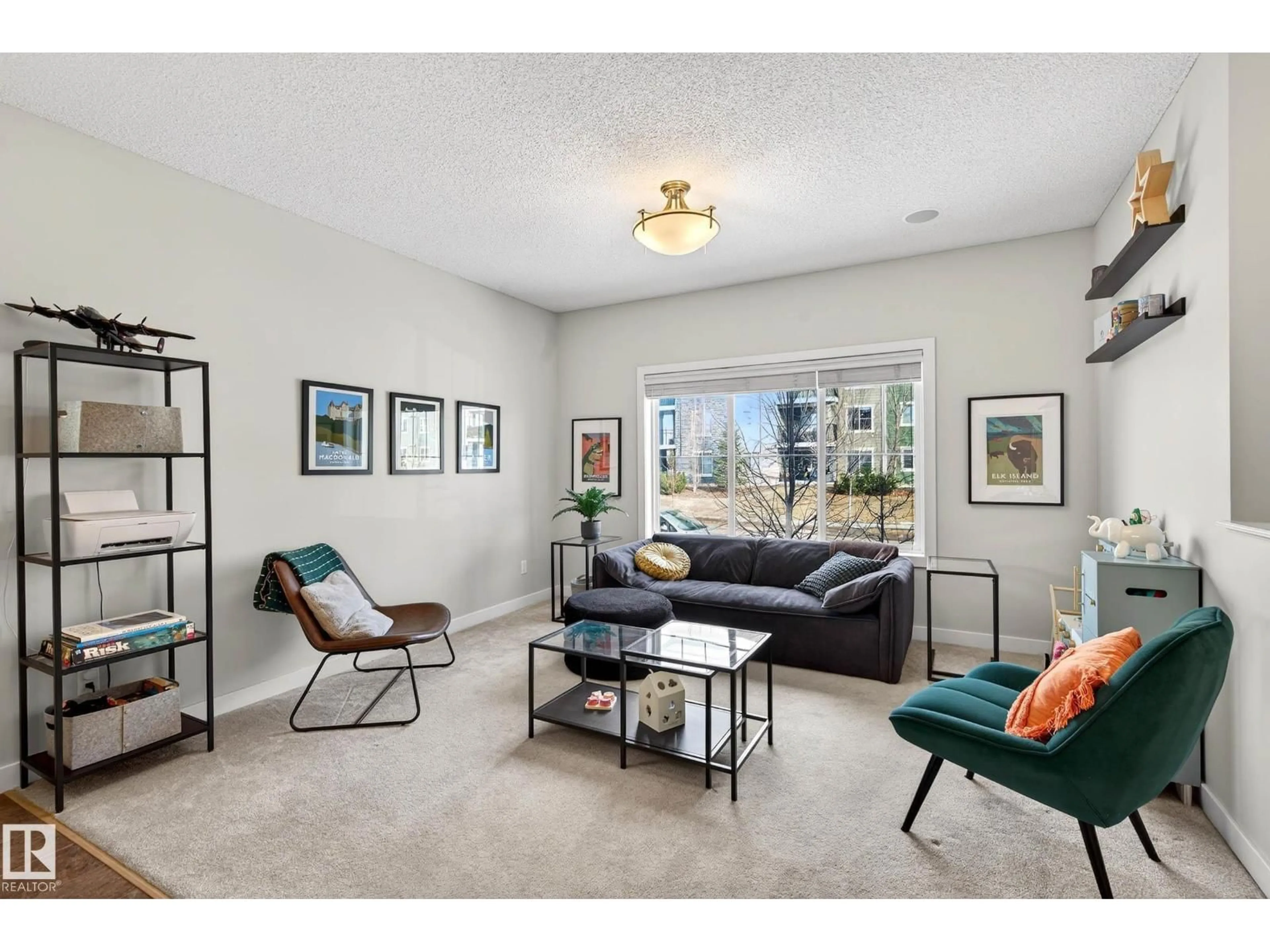 Living room with furniture, unknown for 285 MCCONACHIE DR, Edmonton Alberta T5Y0M7