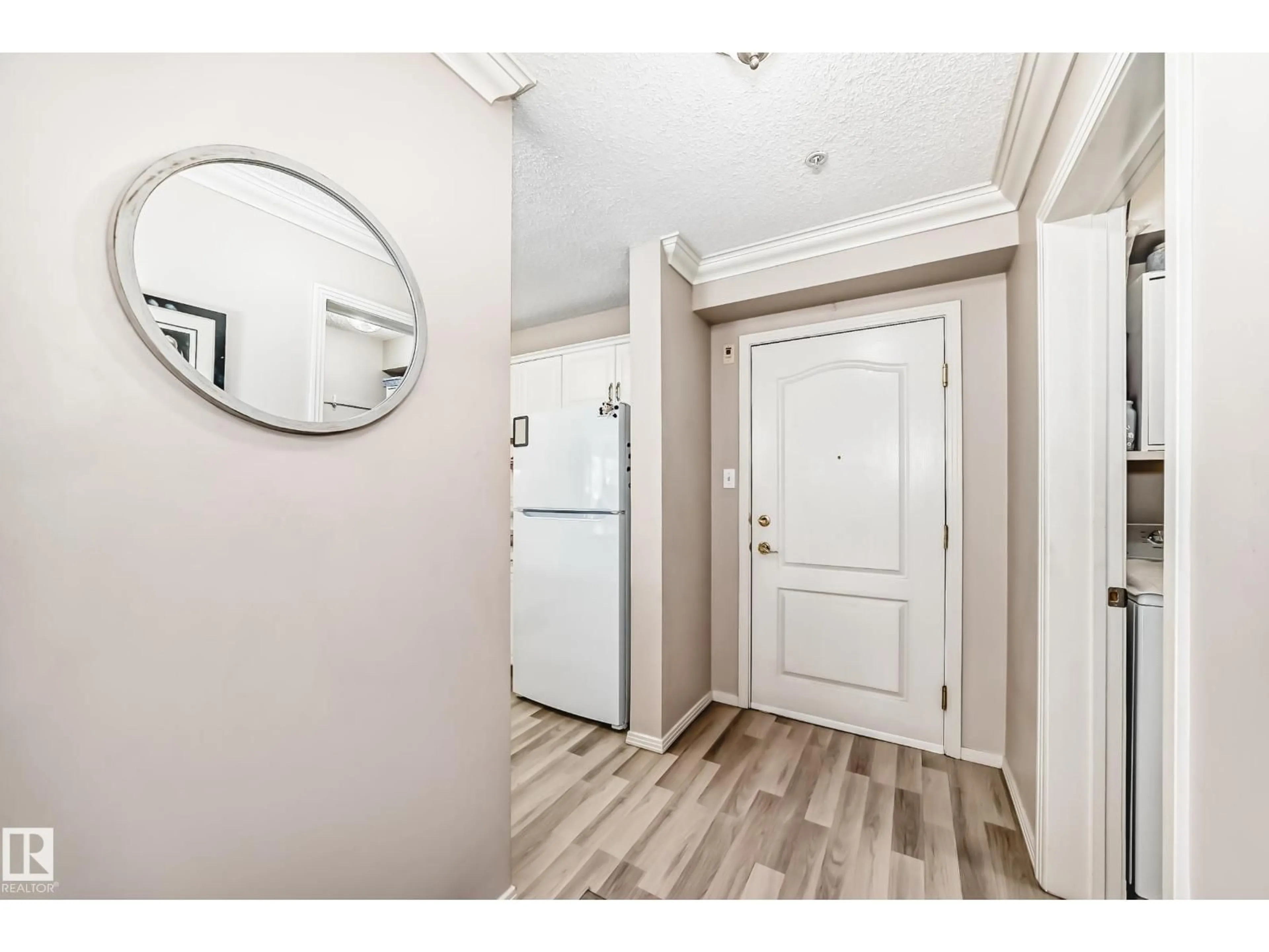 Indoor entryway for 201 - 17150 94A AV, Edmonton Alberta T5T6L7