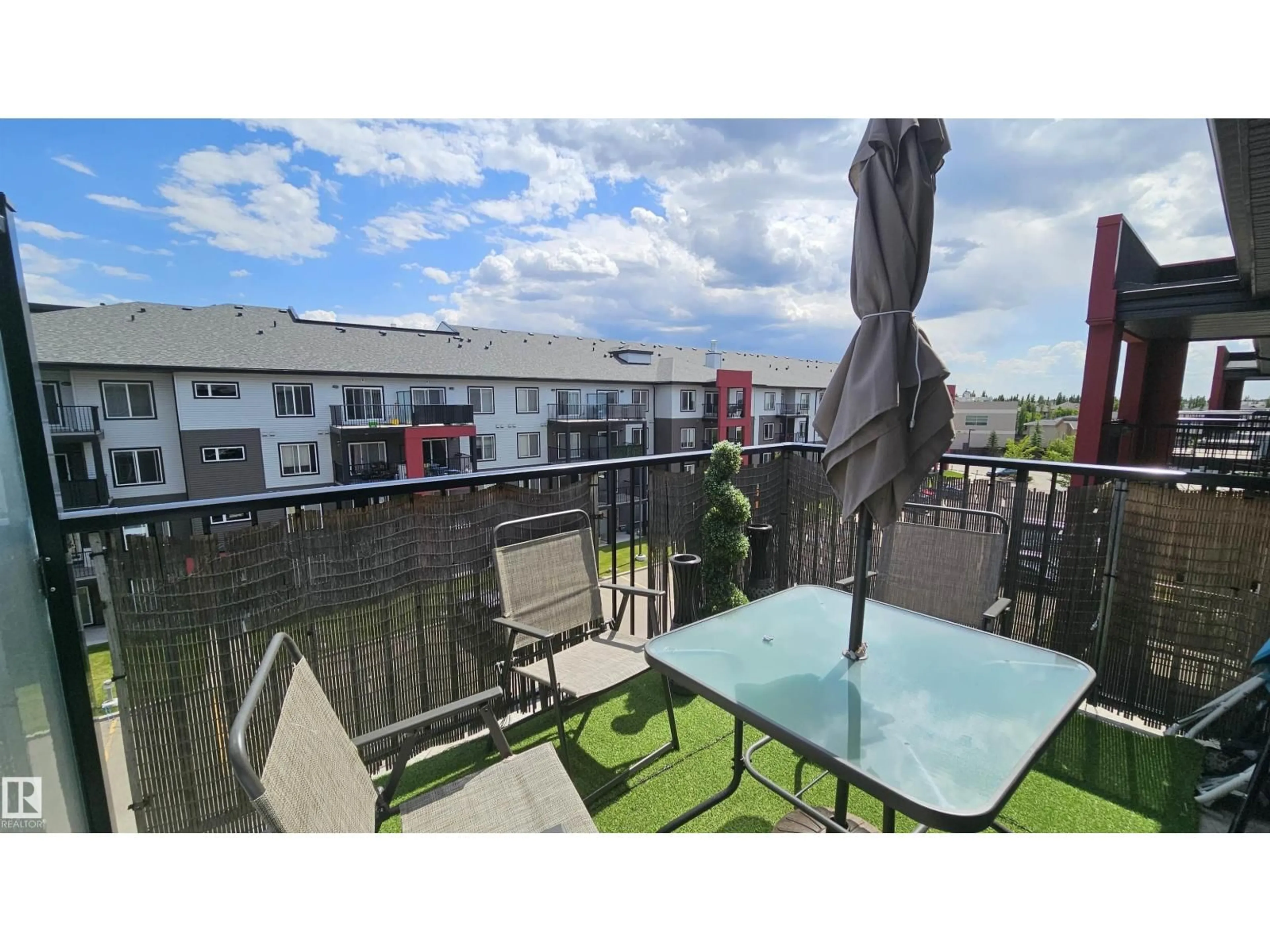 Patio, city buildings view from balcony for 444 - 348 WINDERMERE RD, Edmonton Alberta T6W2P2