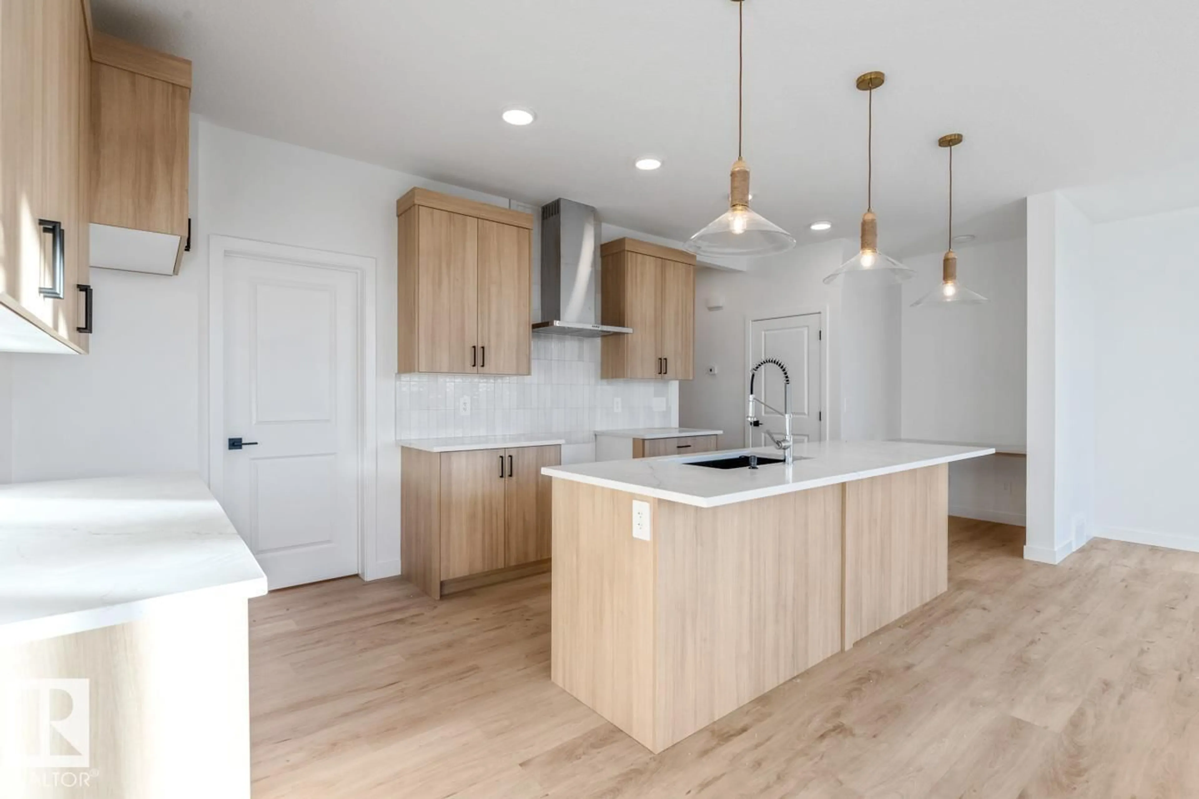 Open concept kitchen, wood/laminate floor for 62 CUDDIE DR, Sherwood Park Alberta T0B0B0