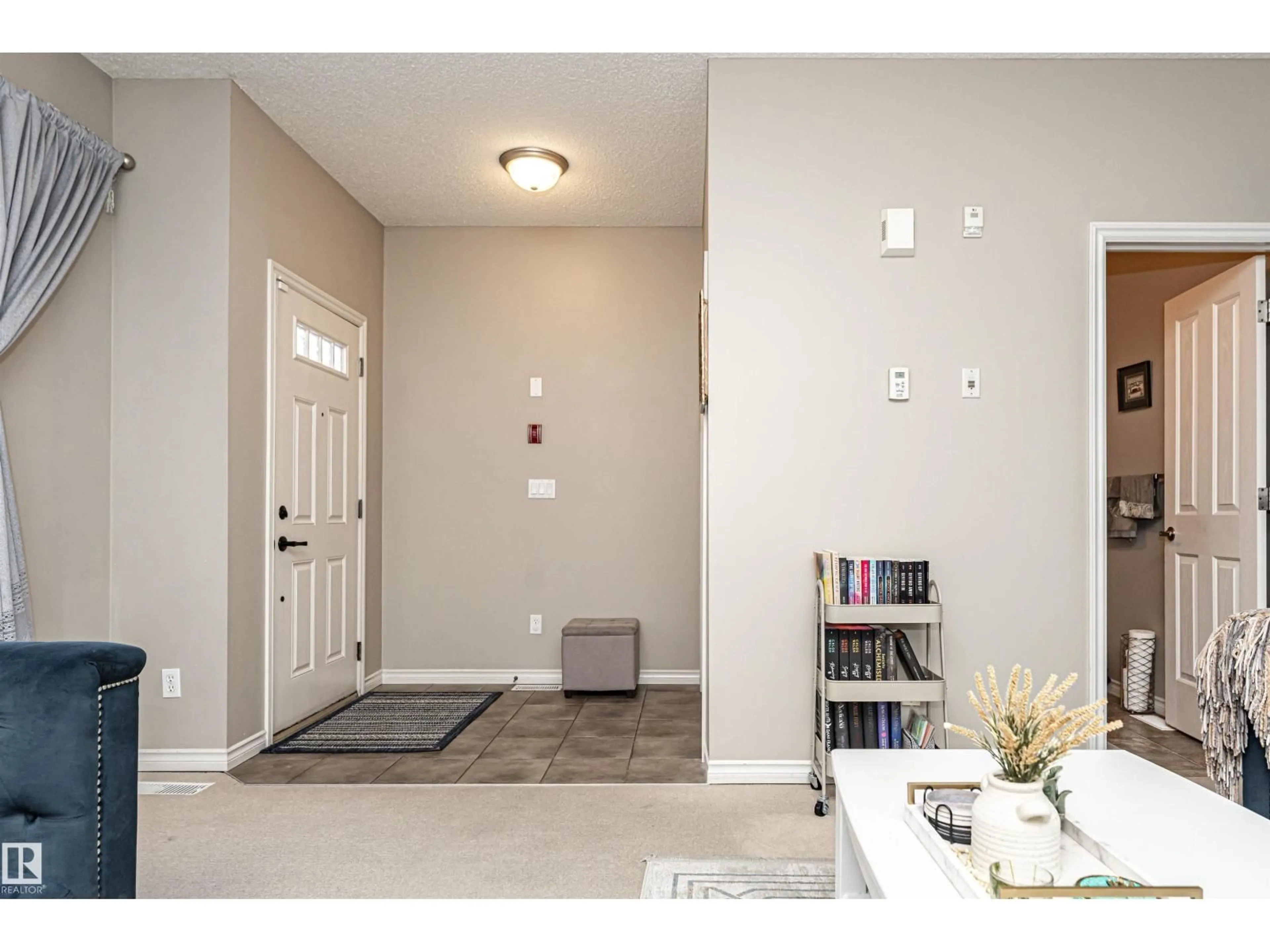 Indoor entryway for #103 - 13825 155 AV, Edmonton Alberta T6V0B8