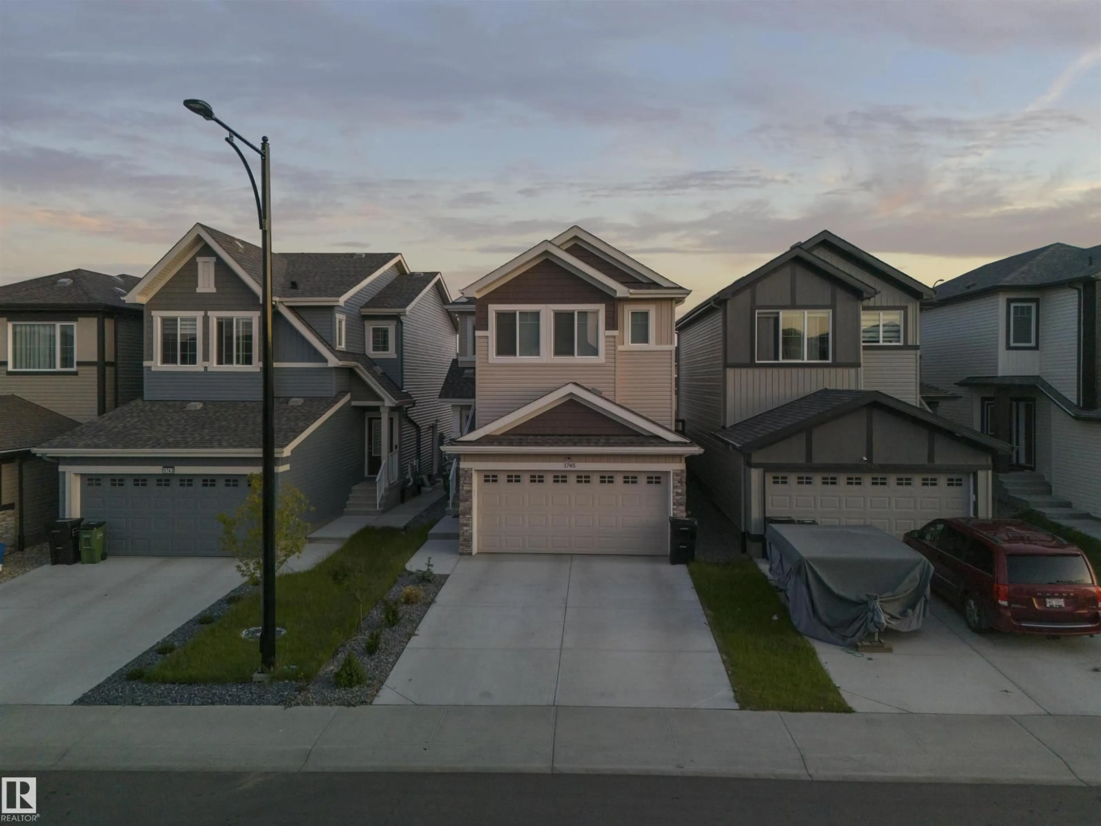 A pic from outside/outdoor area/front of a property/back of a property/a pic from drone, street for 1745 ERKER WY, Edmonton Alberta T6M1J2