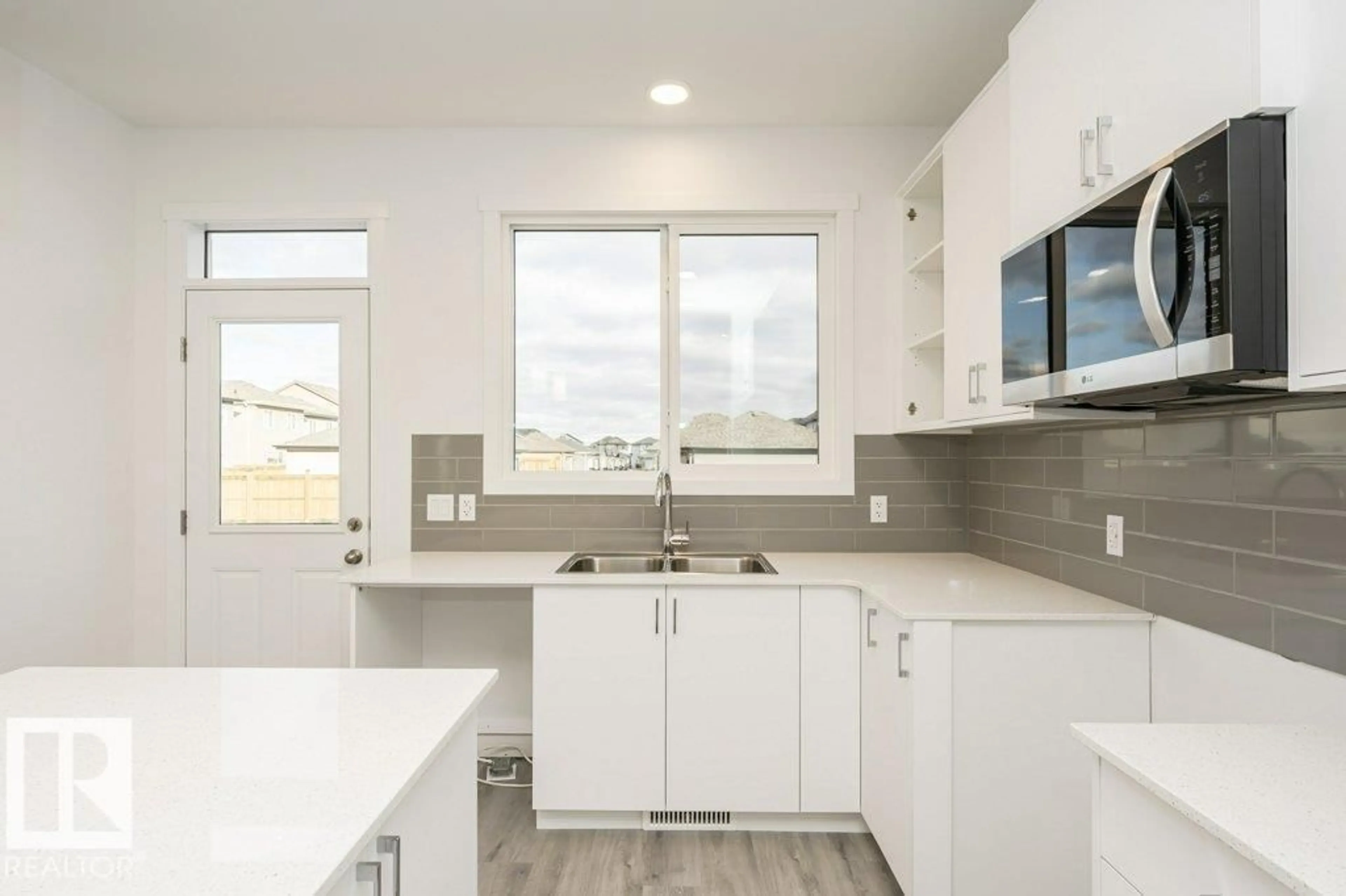 Open concept kitchen, ceramic/tile floor for 335 EDGEMONT DR, Edmonton Alberta T6M3G7