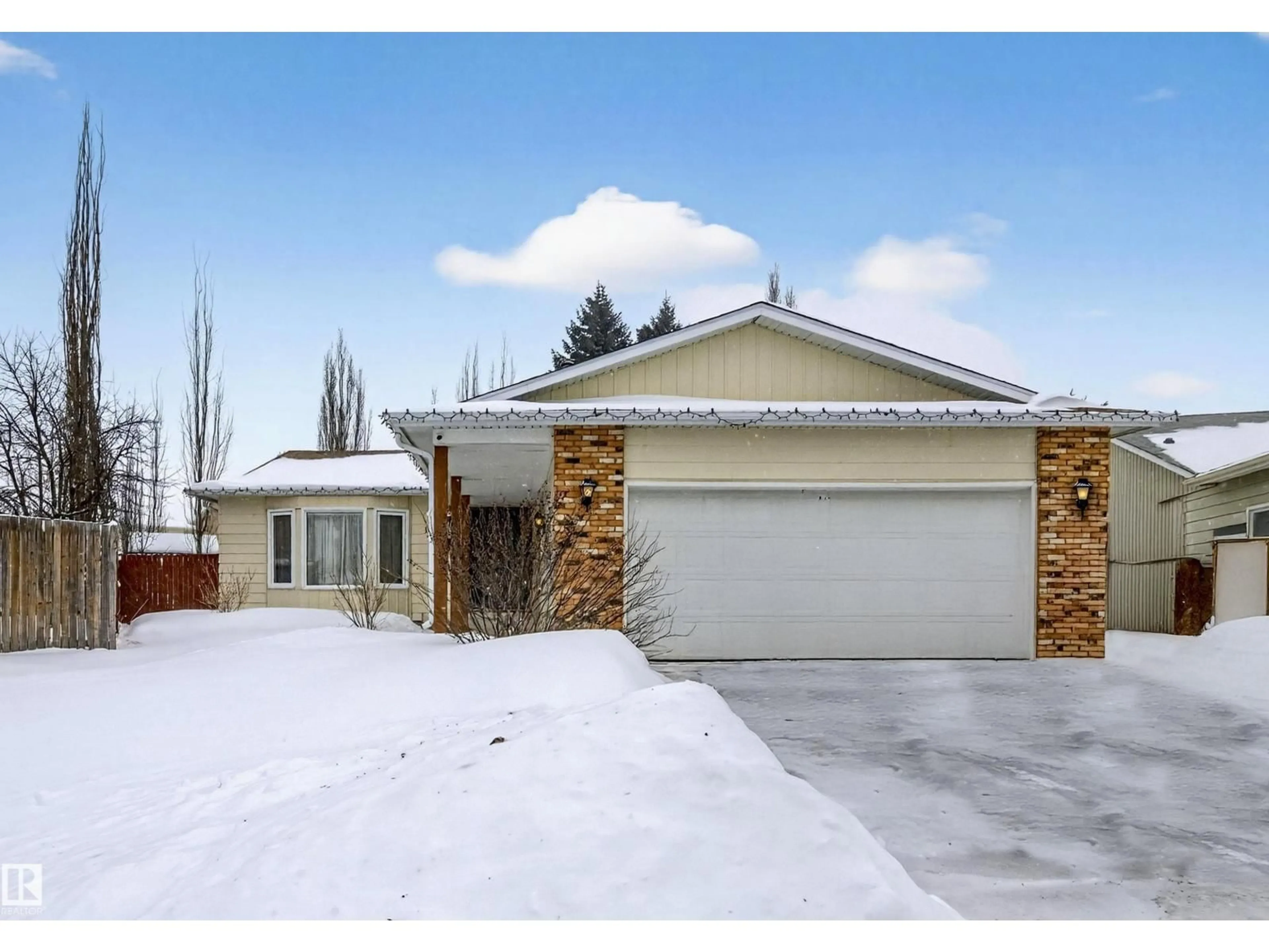 Home with vinyl exterior material, street for 1049 56 ST, Edmonton Alberta T6L1Y4