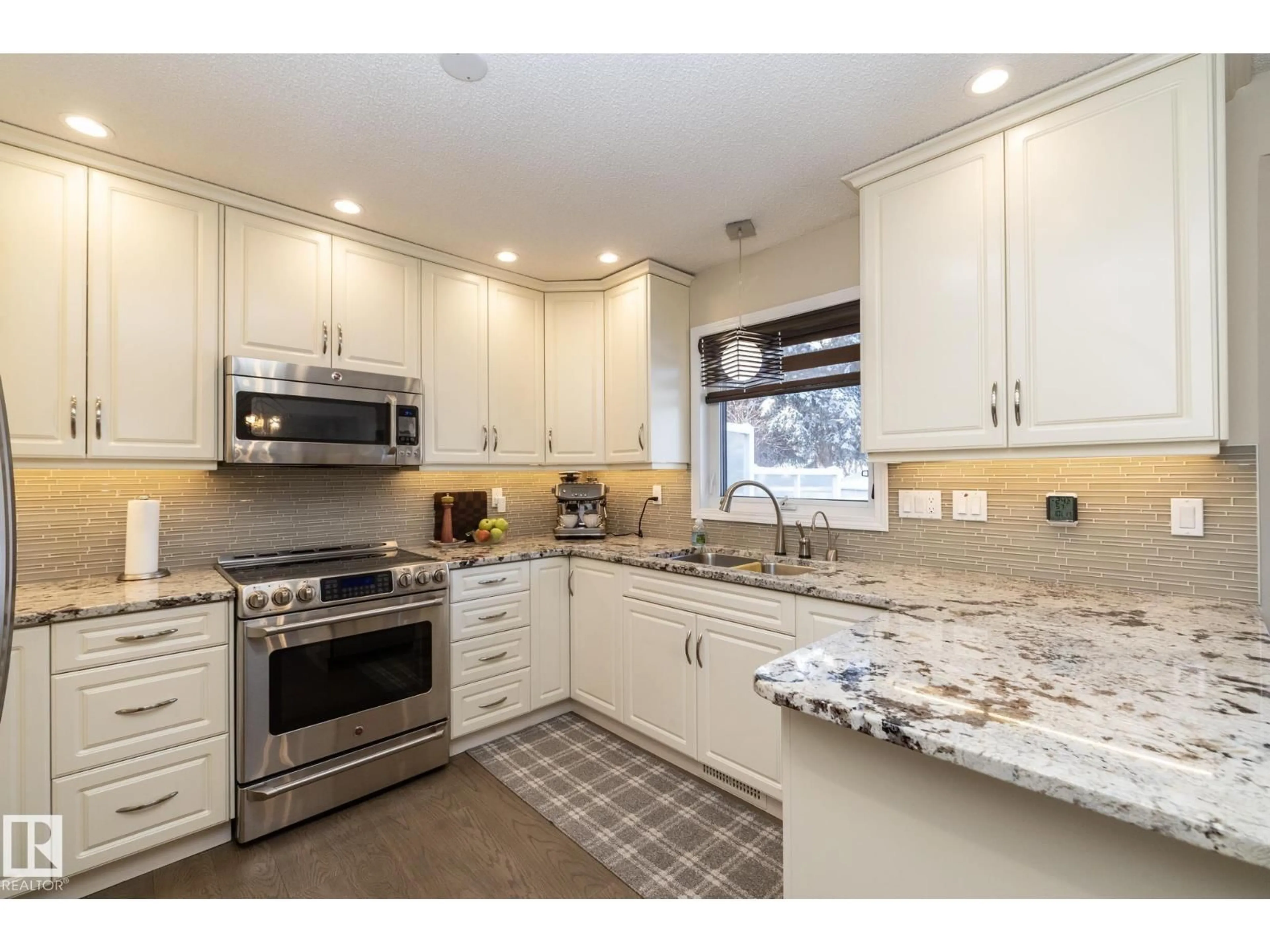 Open concept kitchen, ceramic/tile floor for 932 110A ST, Edmonton Alberta T6J6N1