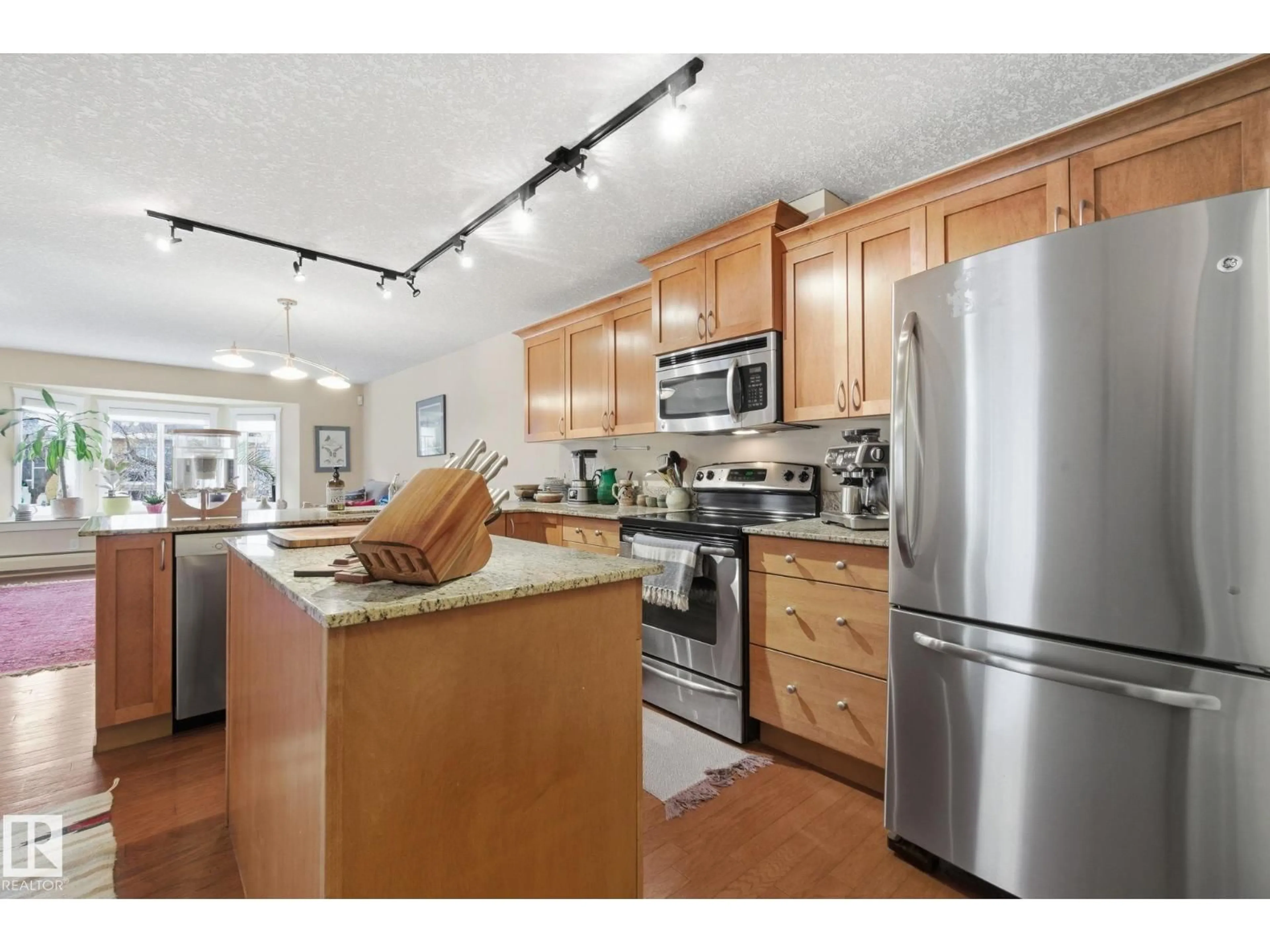 Open concept kitchen, unknown for #201 - 10235 116 ST, Edmonton Alberta T5K1W3