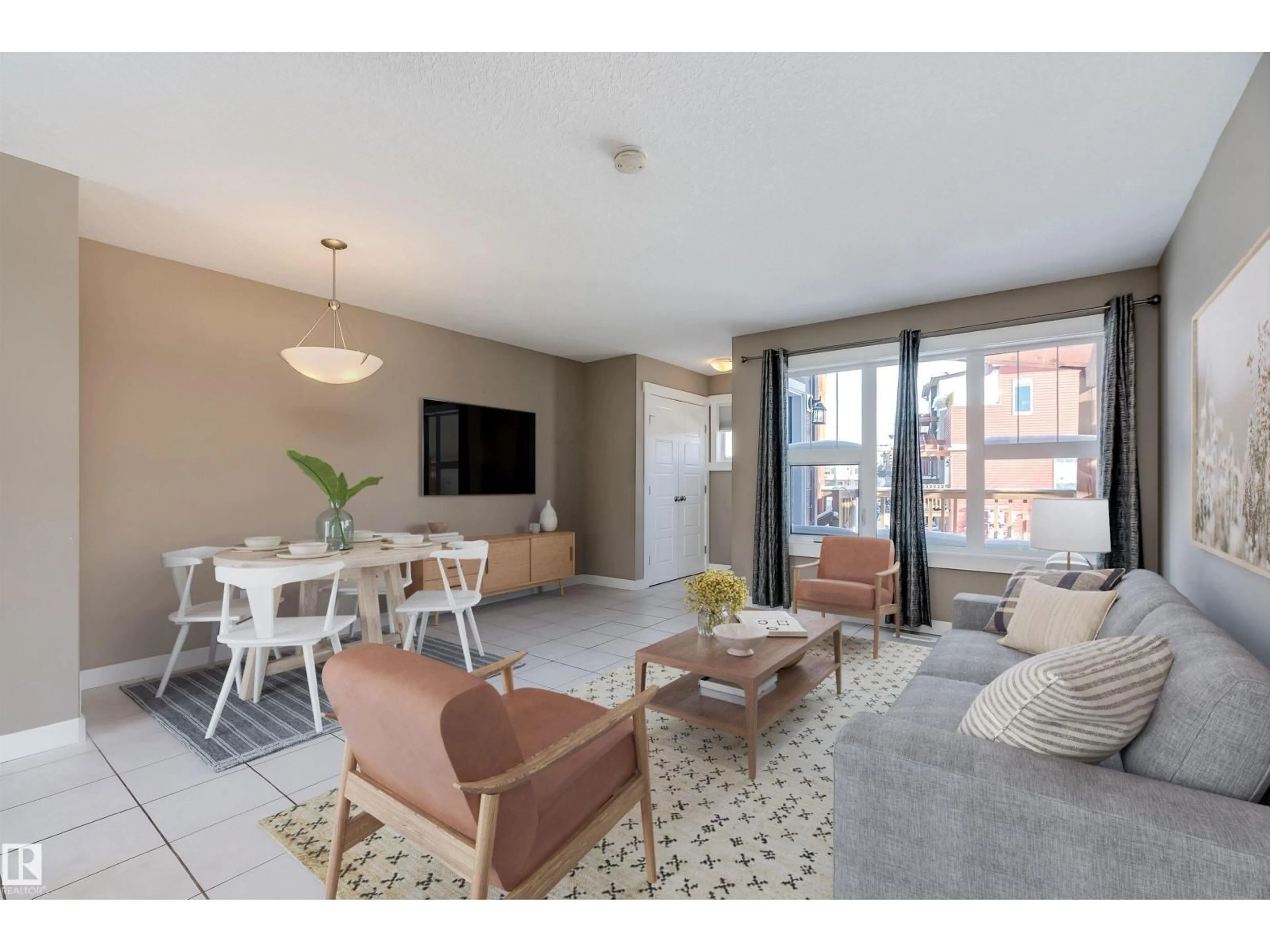 Living room with furniture, unknown for 401 - 131 SOUTHFORK DR, Leduc Alberta T9E0X1