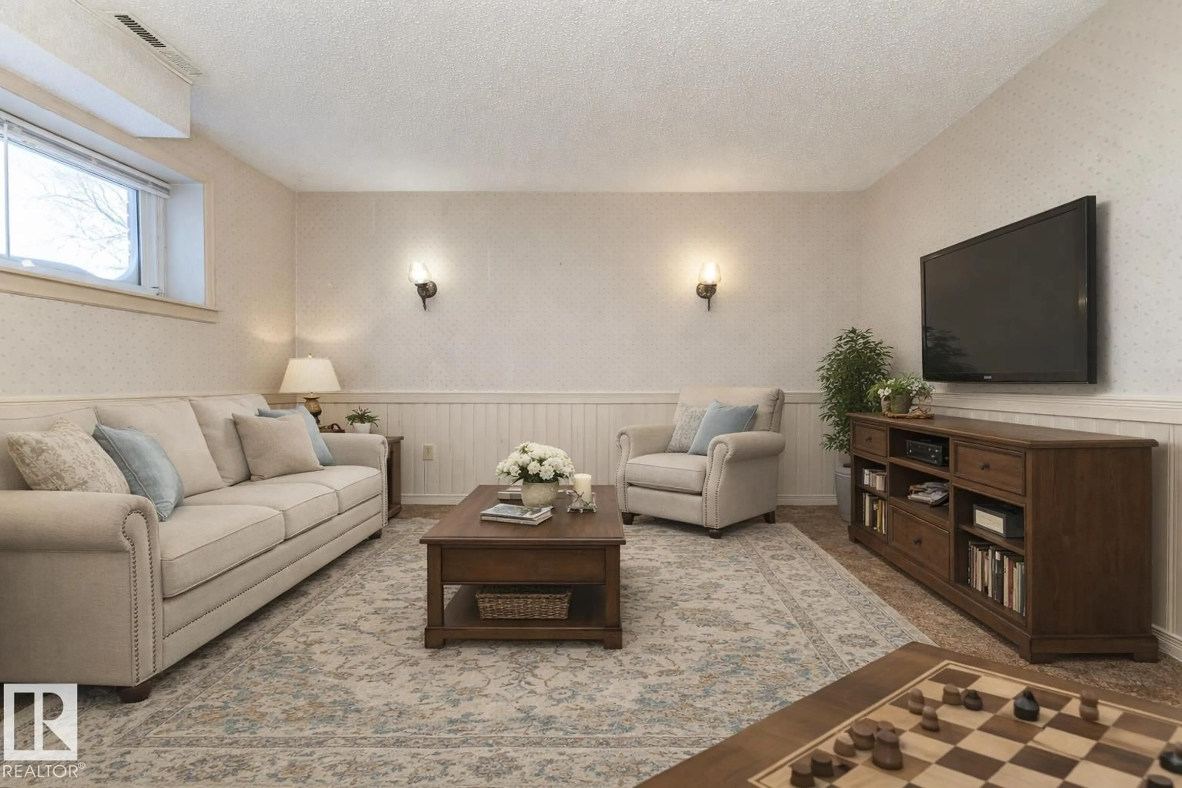 Living room with furniture, unknown for 154 16725 106 ST NW, Edmonton Alberta T5X5G5