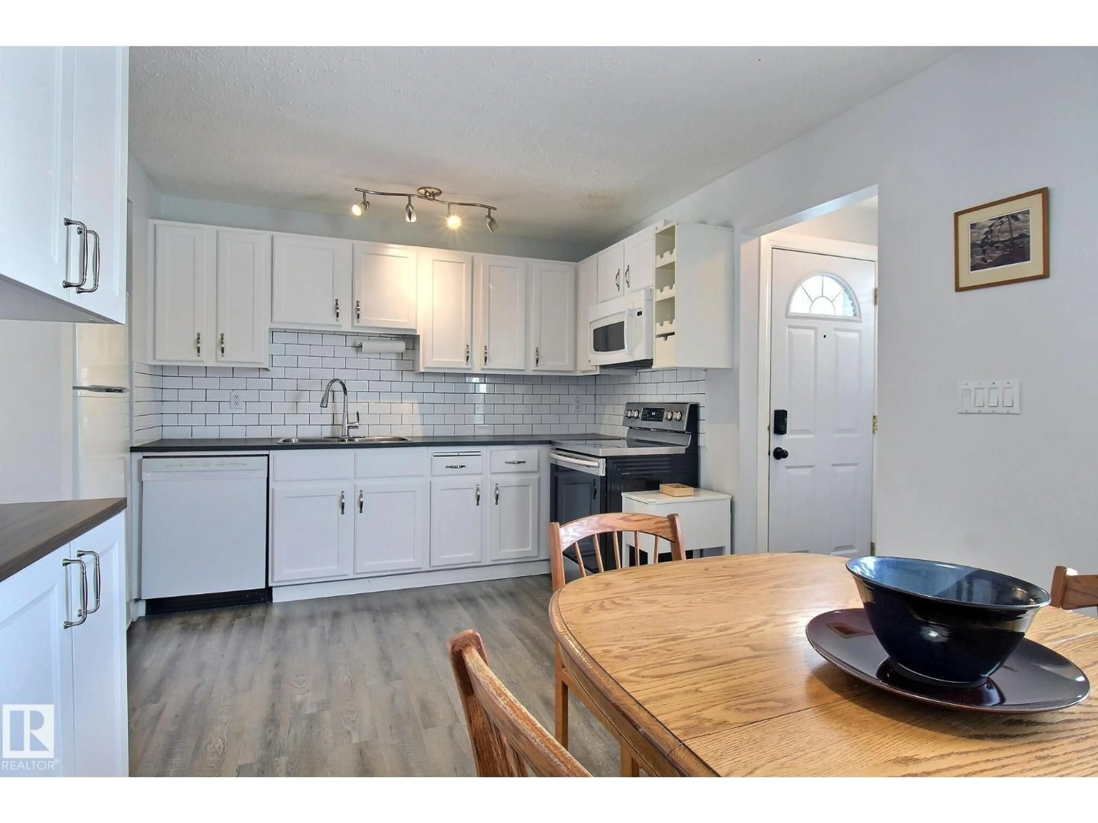 Open concept kitchen, unknown for 10410 28A AV, Edmonton Alberta T6J4J3
