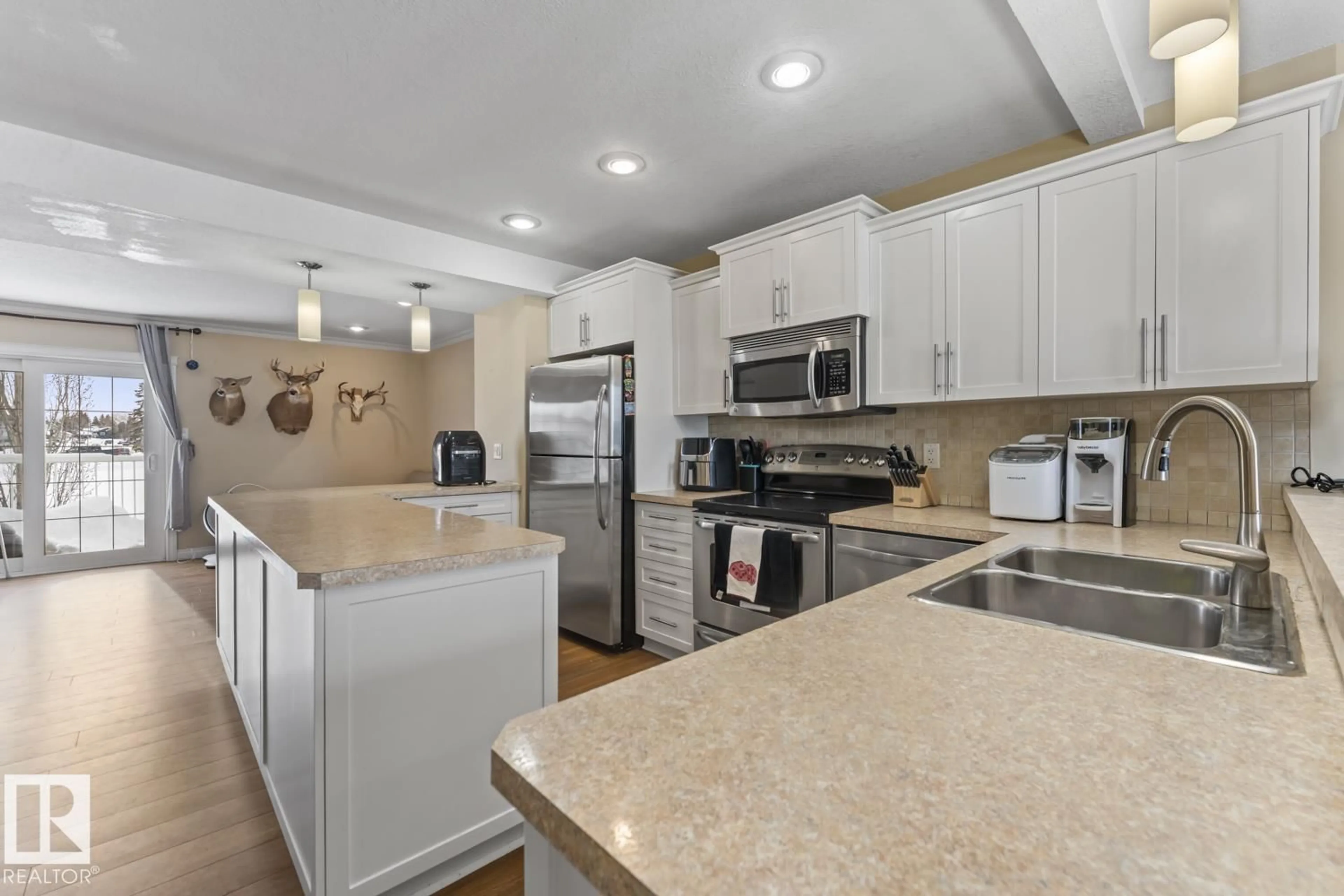 Open concept kitchen, ceramic/tile floor for 7 - 1001 7 AV, Cold Lake Alberta T9M0C4