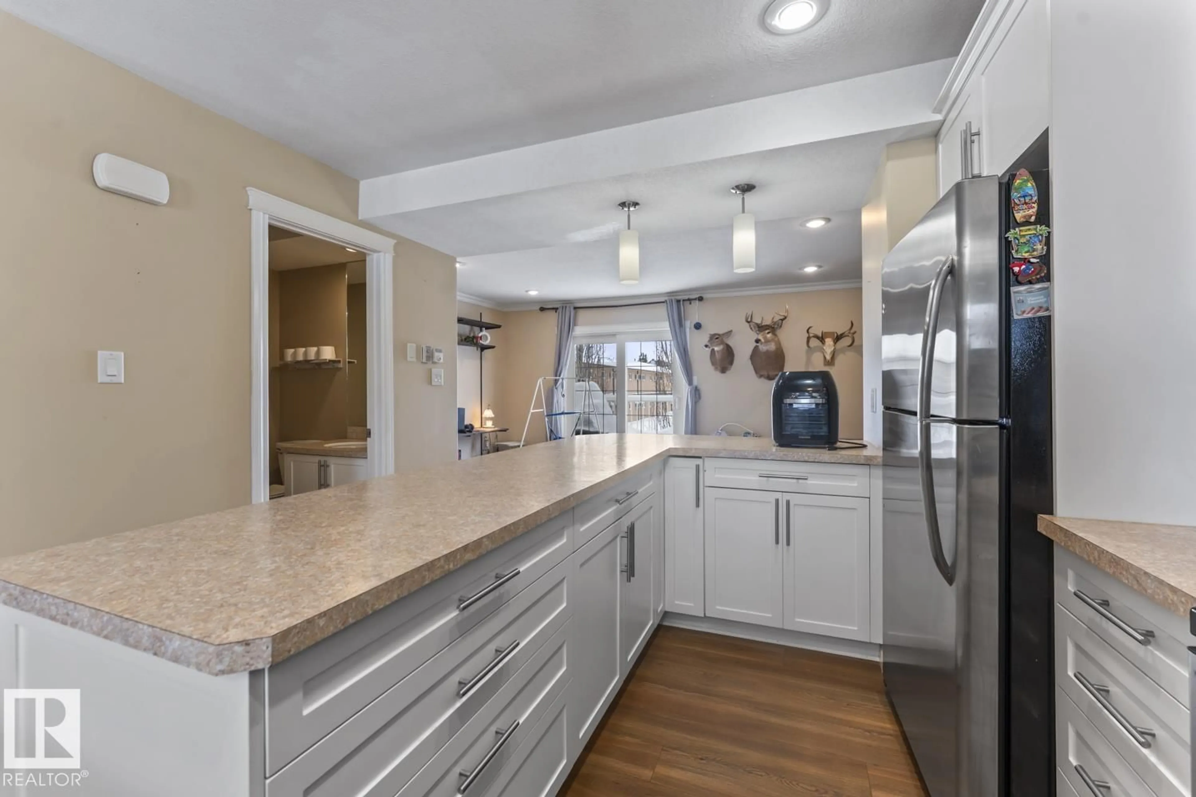 Open concept kitchen, ceramic/tile floor for 7 - 1001 7 AV, Cold Lake Alberta T9M0C4