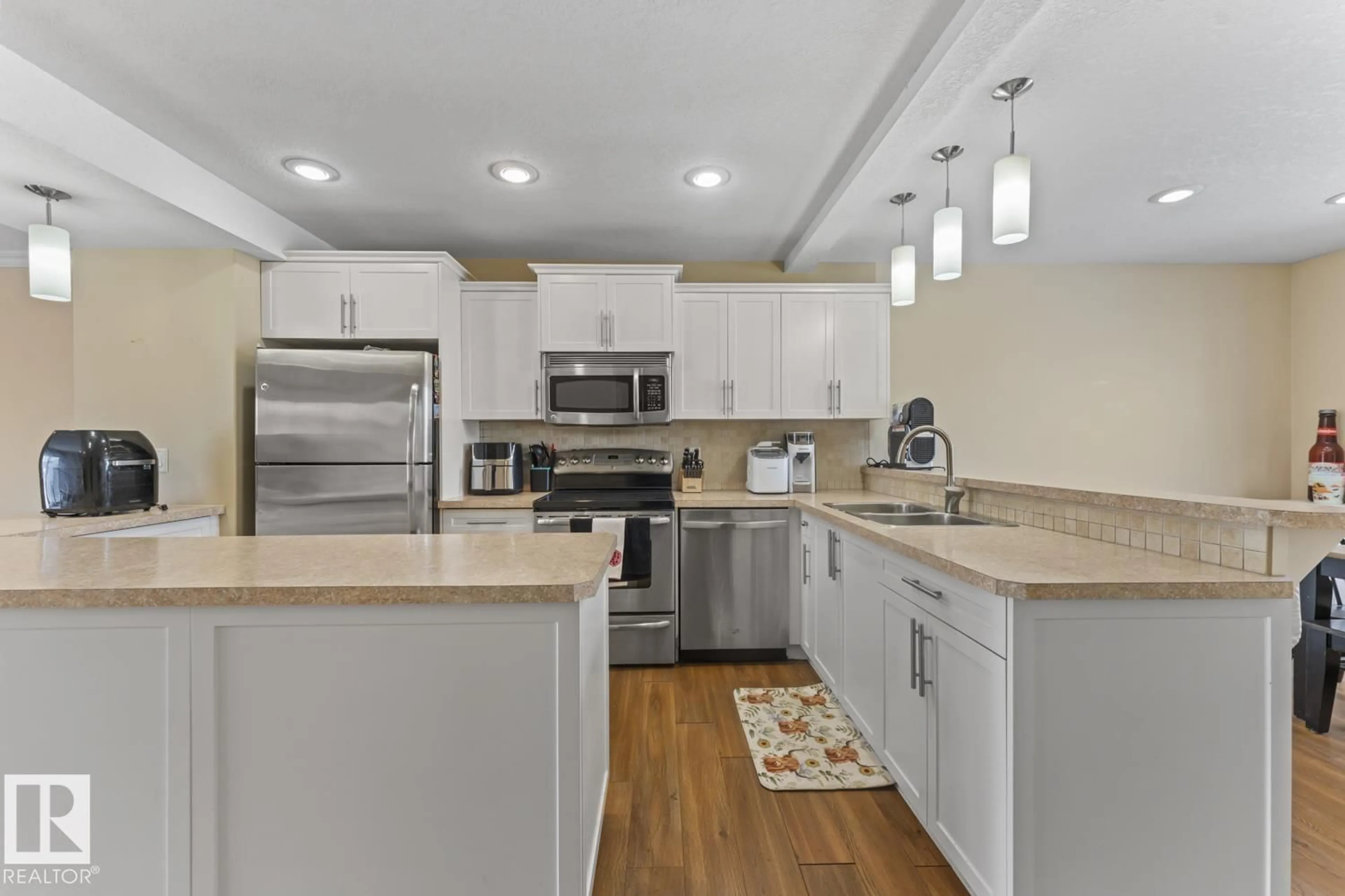 Open concept kitchen, ceramic/tile floor for 7 - 1001 7 AV, Cold Lake Alberta T9M0C4