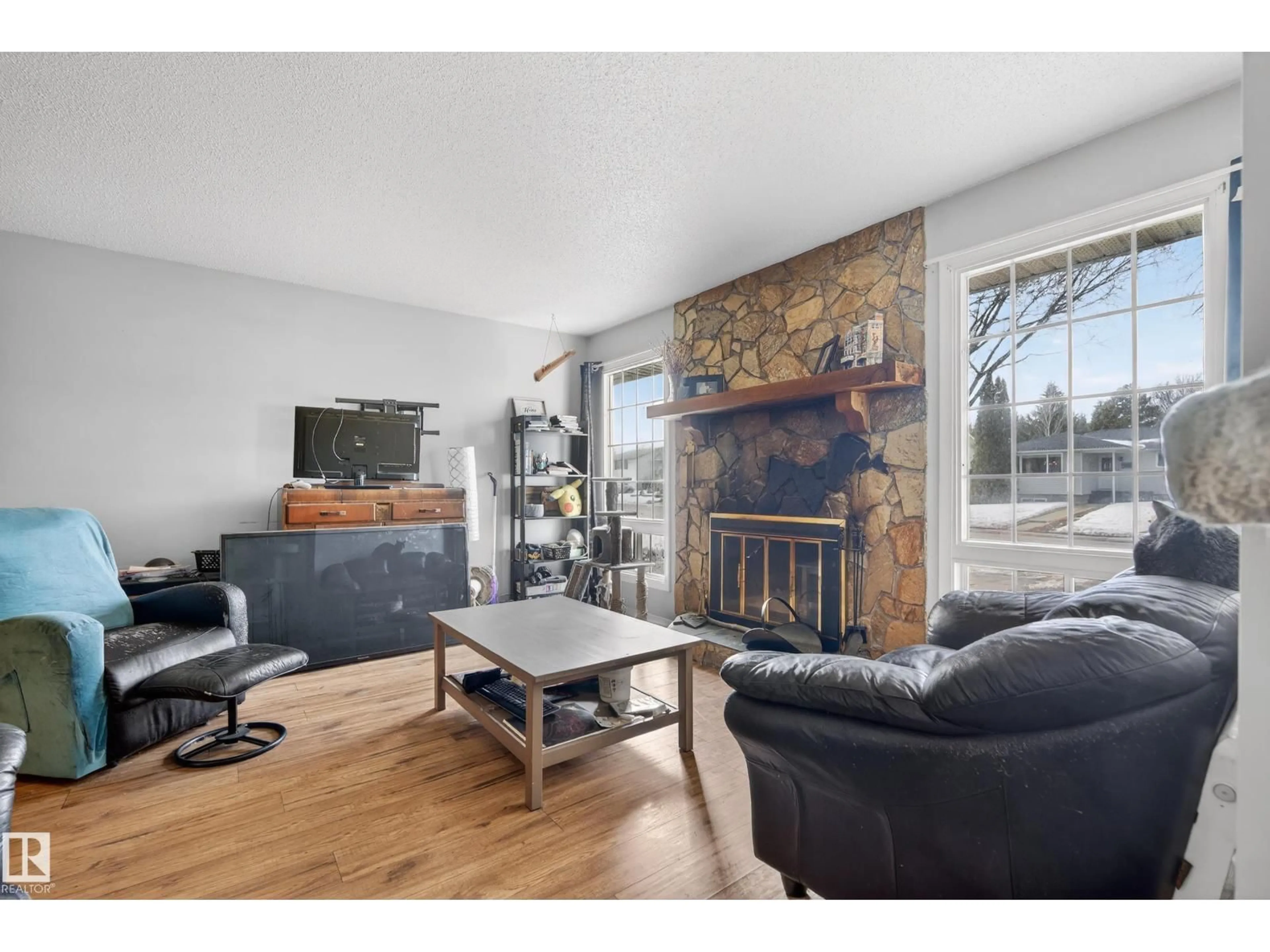 Living room with furniture, wood/laminate floor for 153 MARION DR, Sherwood Park Alberta T8A2G9