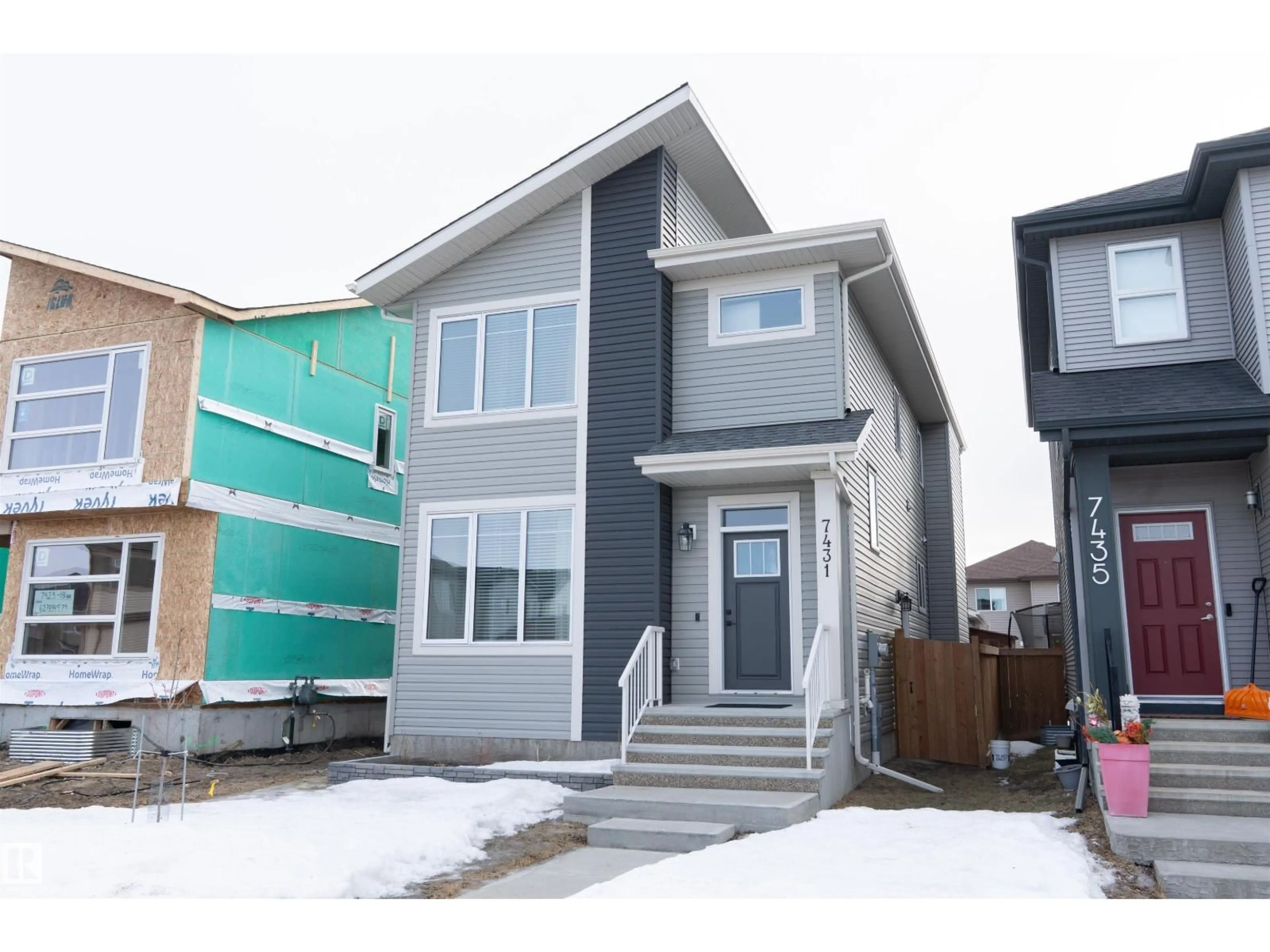 Home with vinyl exterior material, street for NW - 7431 181 AV, Edmonton Alberta T5Z0M2