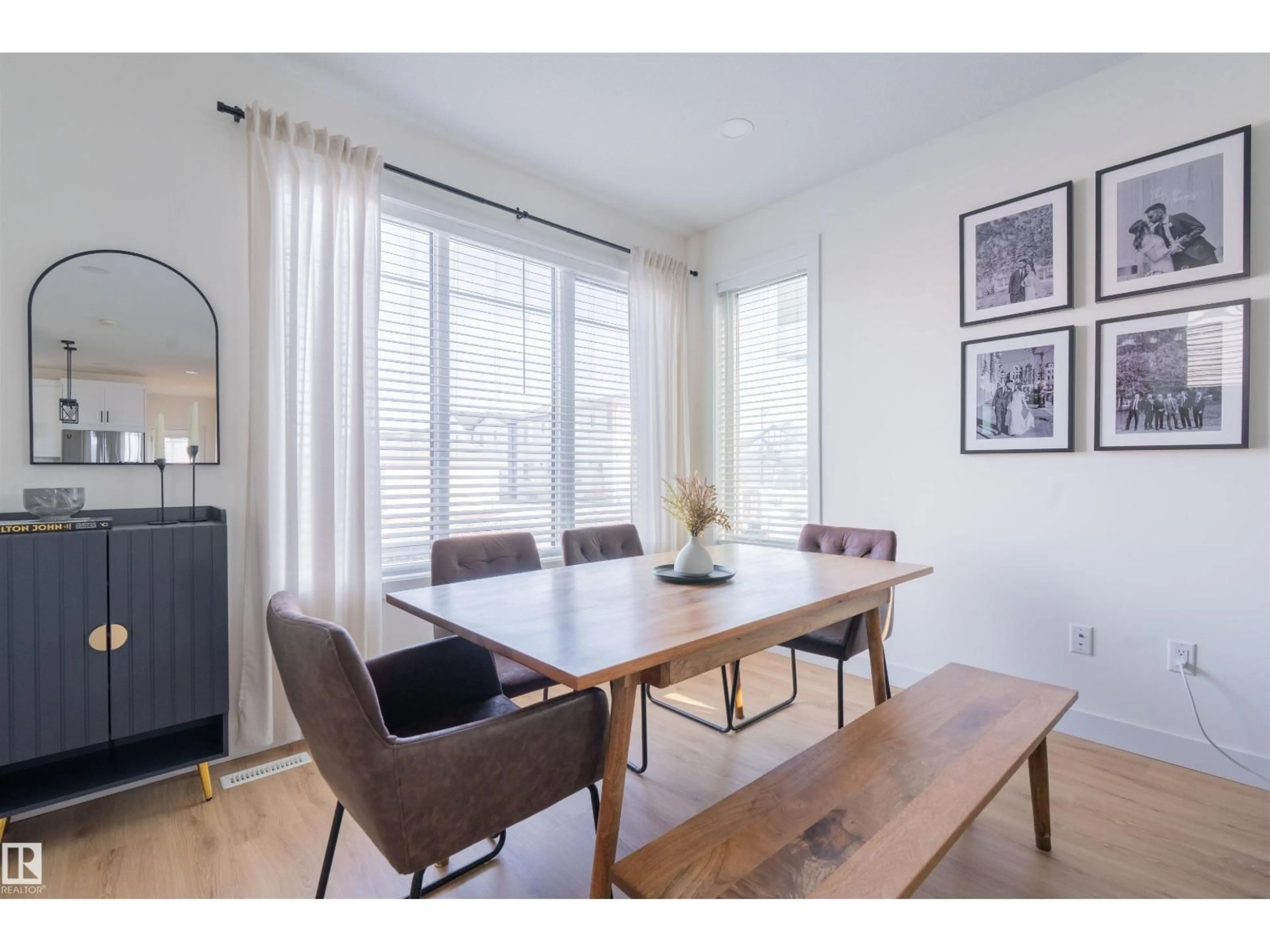 Dining room, wood/laminate floor for NW - 7431 181 AV, Edmonton Alberta T5Z0M2