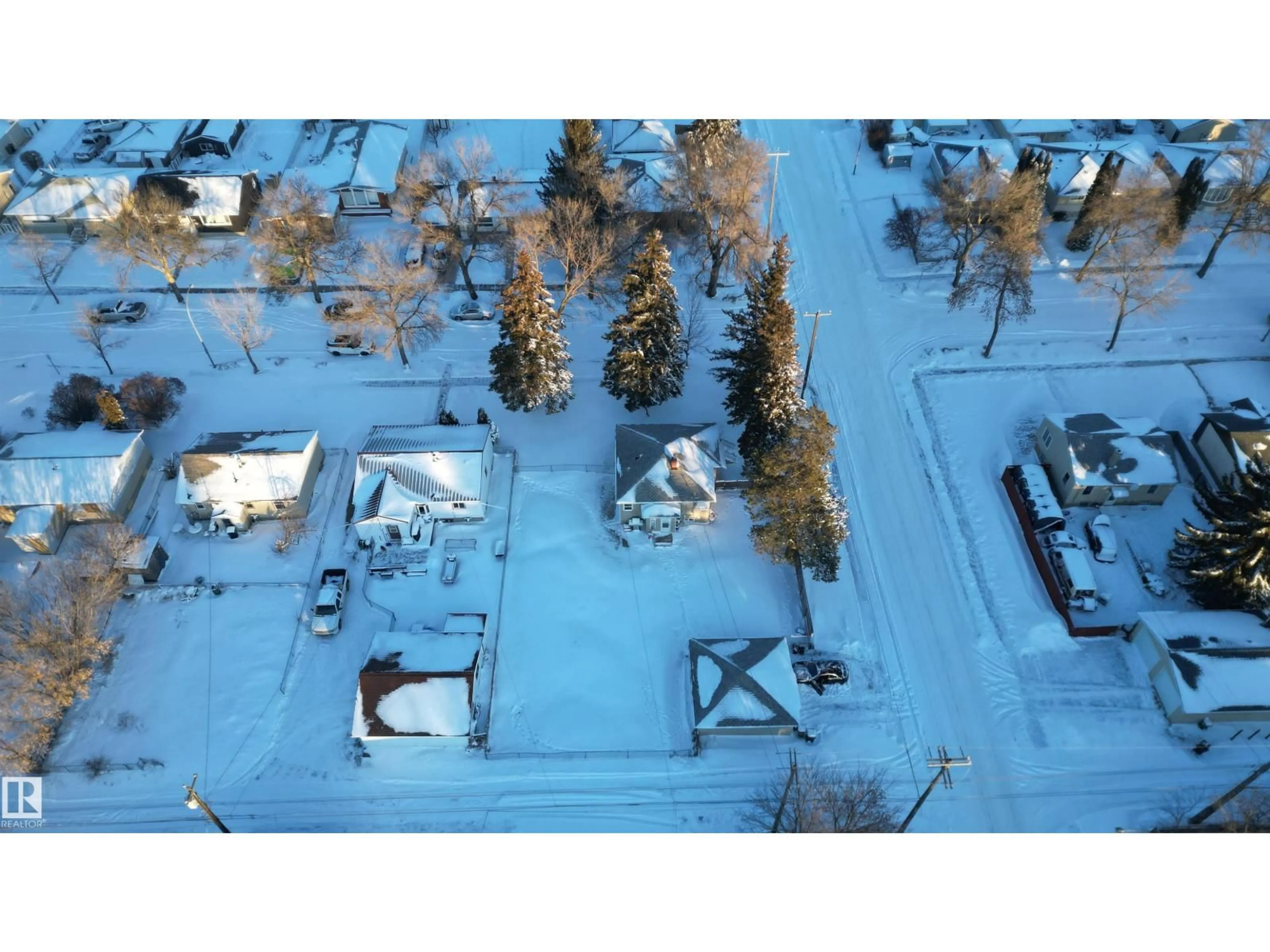 A pic from outside/outdoor area/front of a property/back of a property/a pic from drone, unknown for NW - 12202 49 ST, Edmonton Alberta T5W3A8