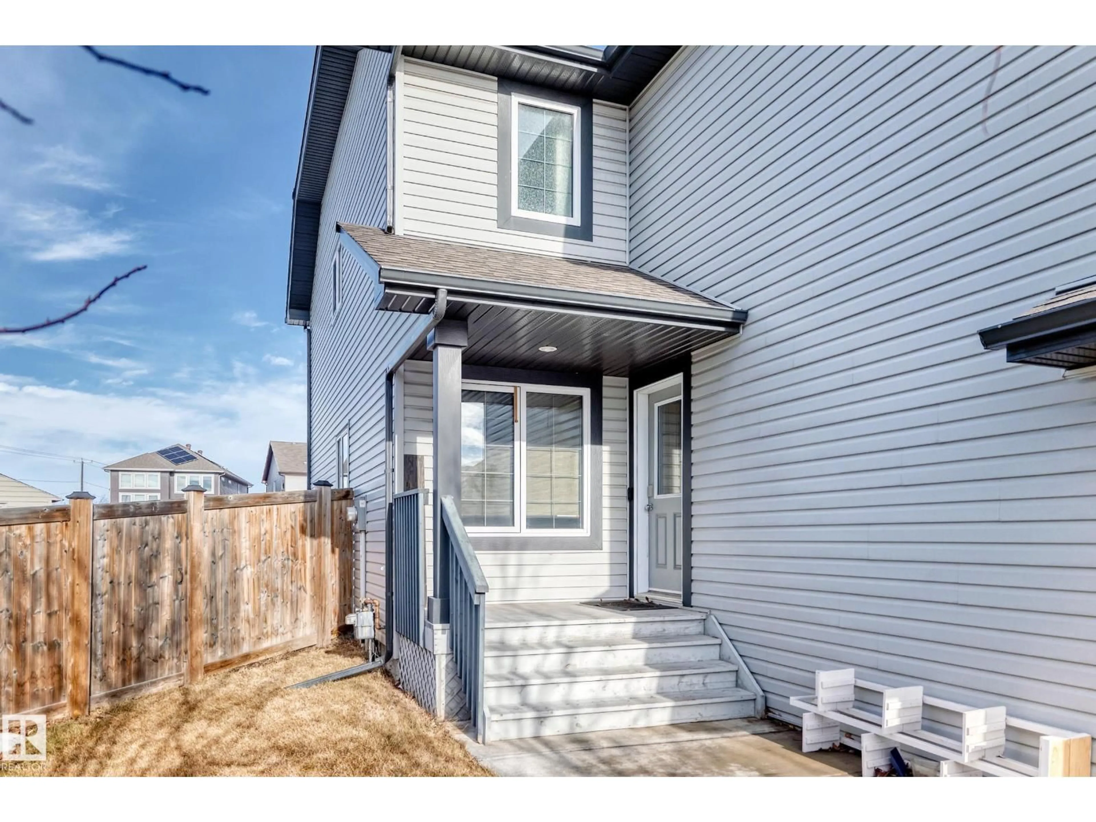 Home with vinyl exterior material, street for 12530 172 AV, Edmonton Alberta T5X0E6